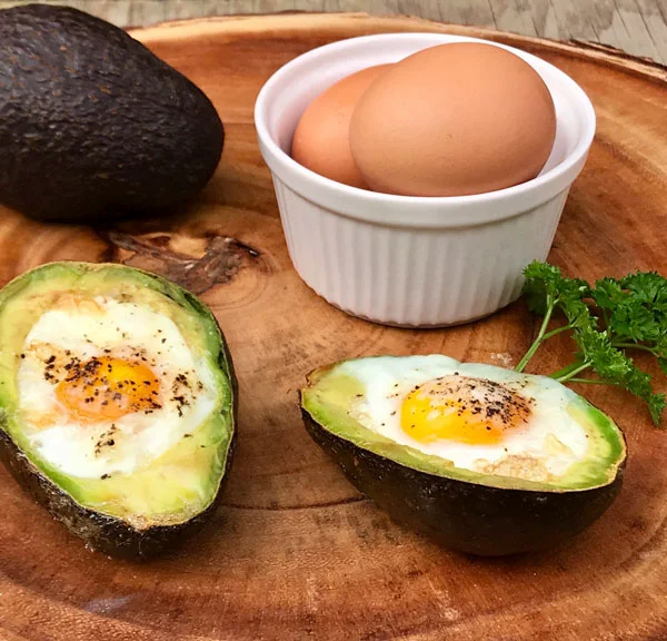 A healthy and nutritious breakfast from nutritional therapist in london, tracy tredoux. Baked avocado egg cups.