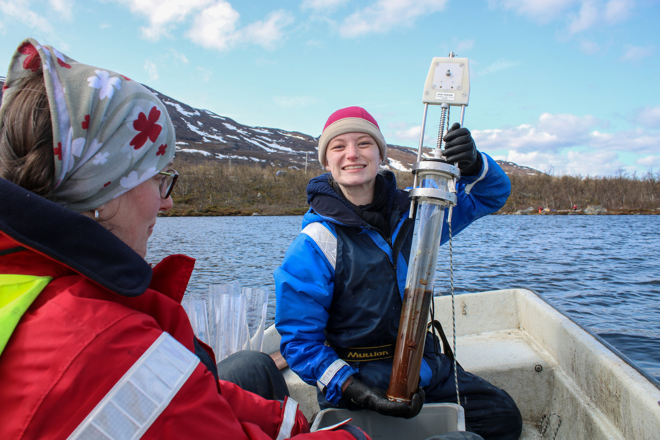 Hannah Beck and Jenny Ask Sediment Sampling Lake Almberga 03June19 Photo by Emma.jpg