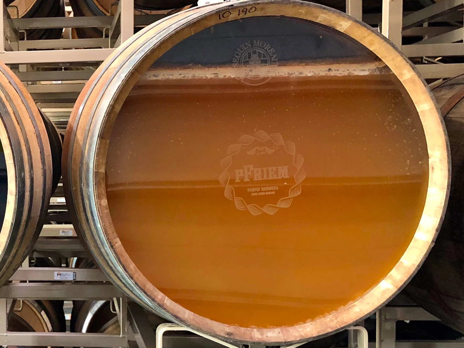 A glass-topped wine barrel reveals the biology happening inside.