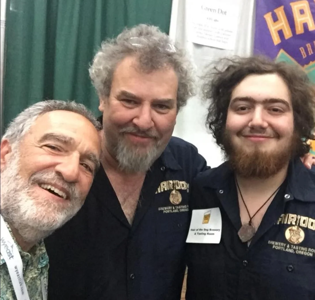 Alan, center, with his son and Charlie Papazian at Homebrew Con (Credit: Hair of the Dog )