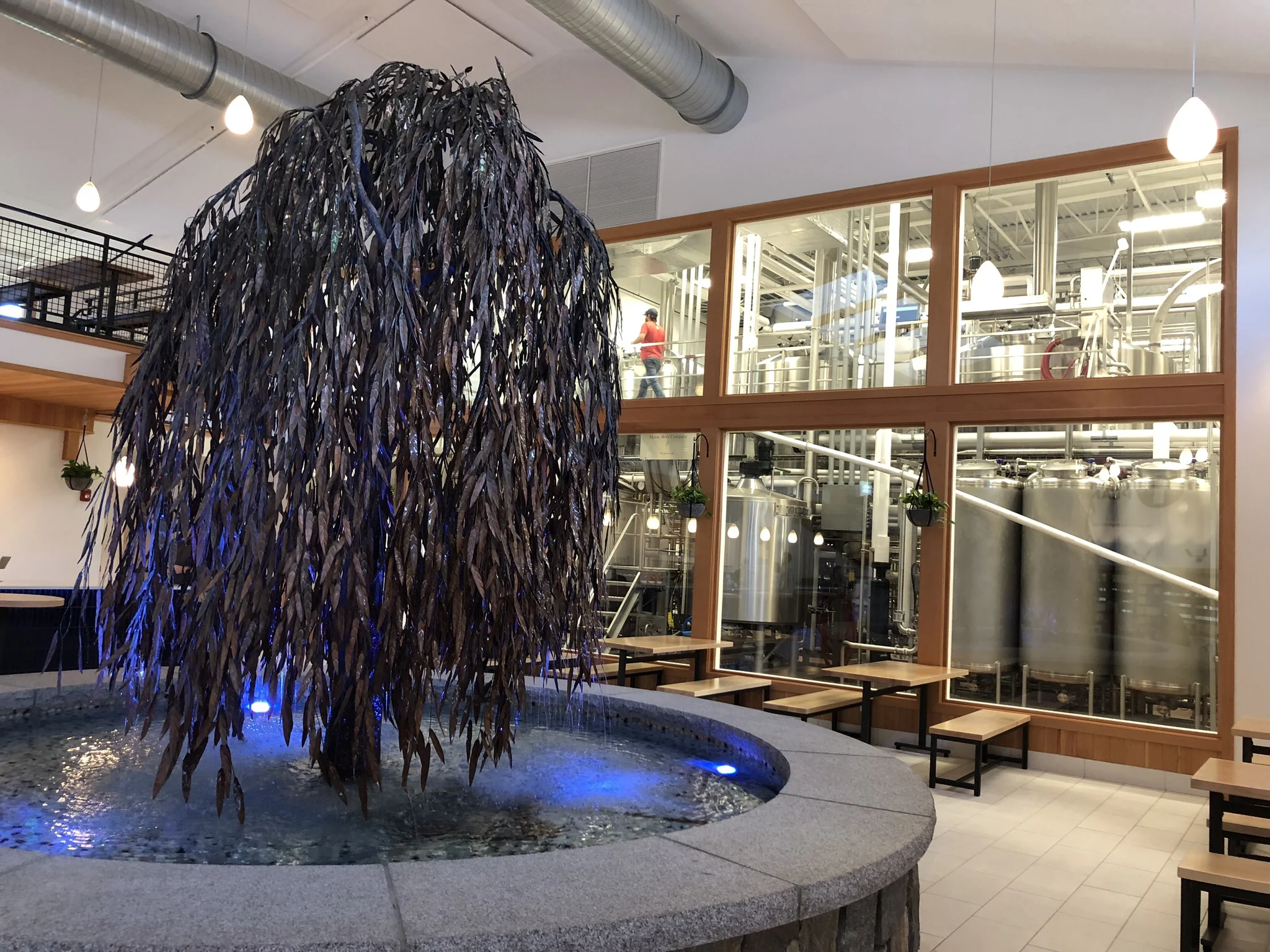 I was most curious about the fountain, which was framed out when we visited last. It’s an Instagrammable willow tree through which water trickles.