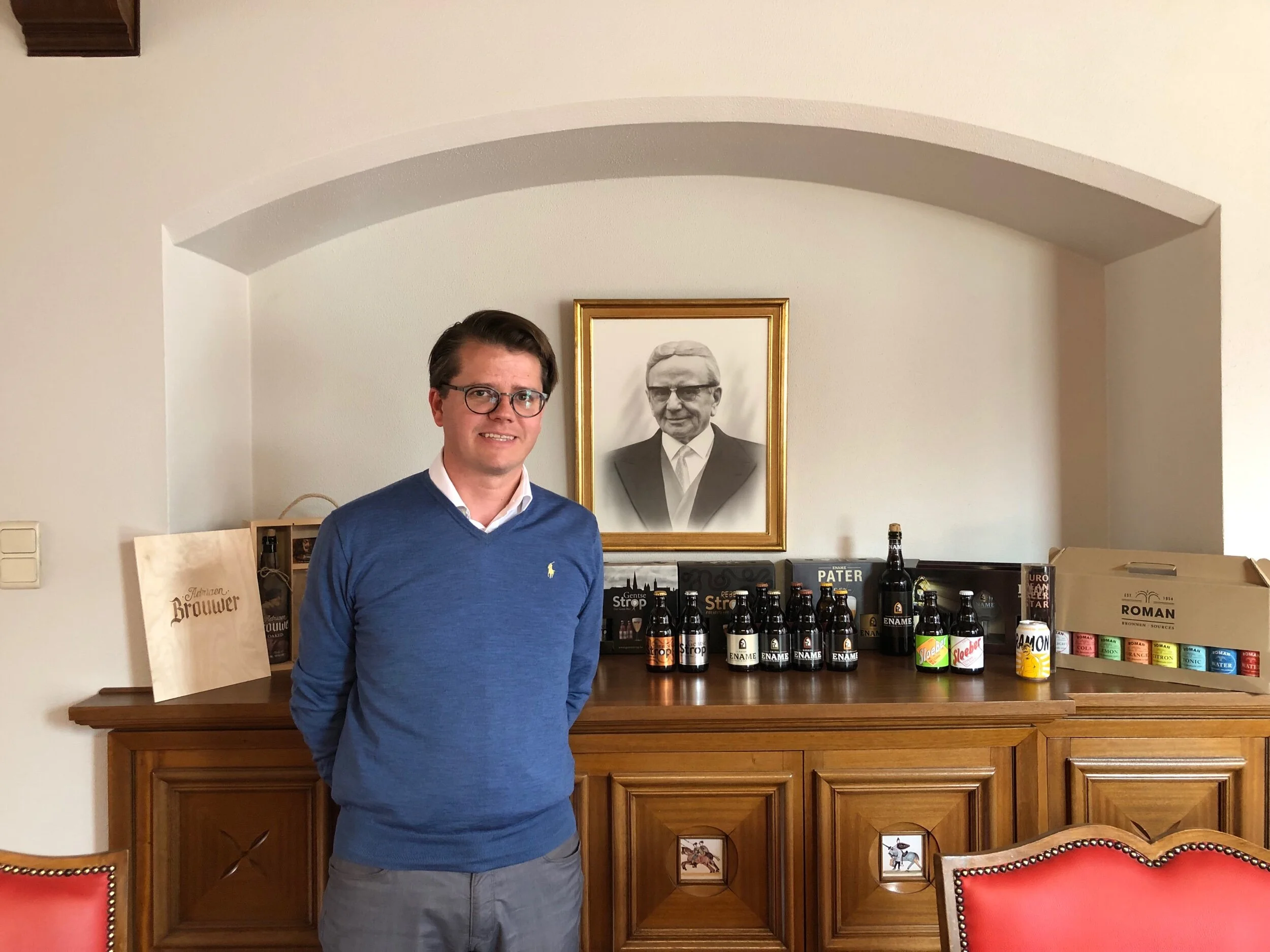 Lode Roman, a member of 14th generation the family can trace back, and the third generation since his grandfather, pictured behind him, built the brewery.