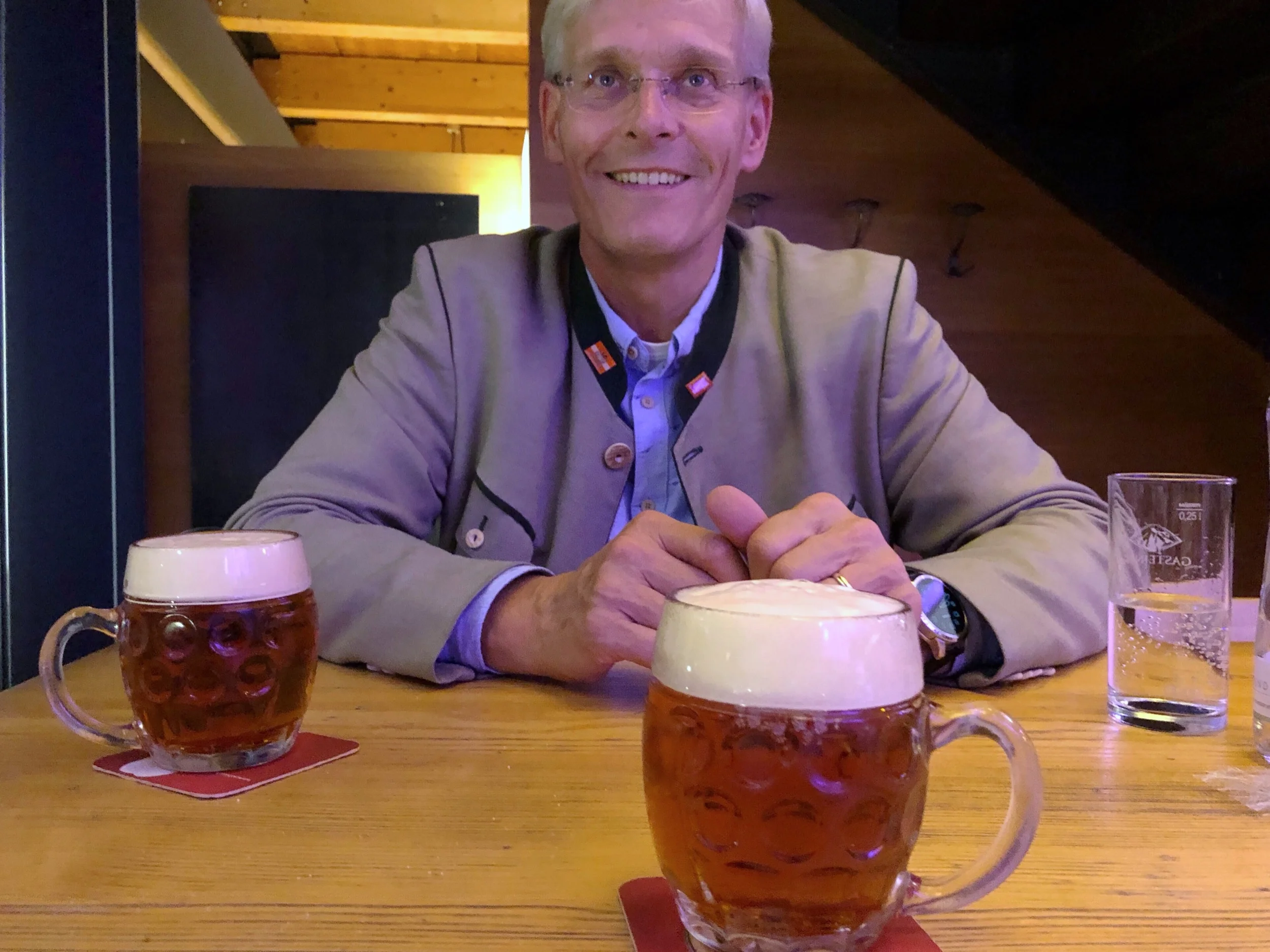 Andreas Urban and freshly-poured mugs of Vienna lager.
