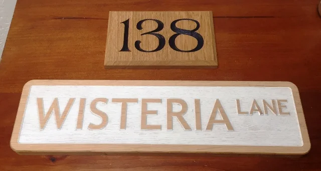 A couple of simple signs - v-carved, painted and sanded. 