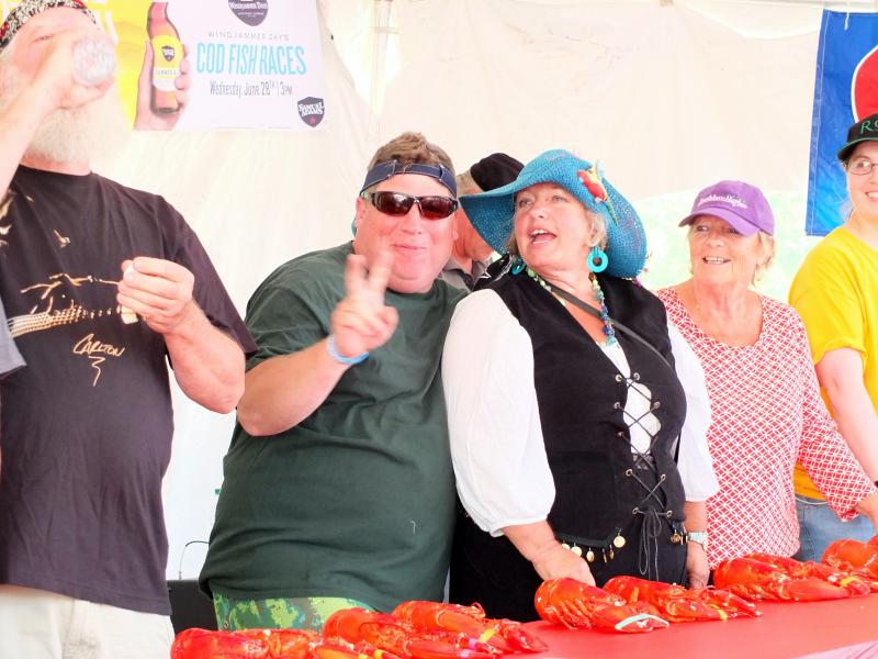 Joe Christopher gives the peace sign prior to eating to retain his title.JPG