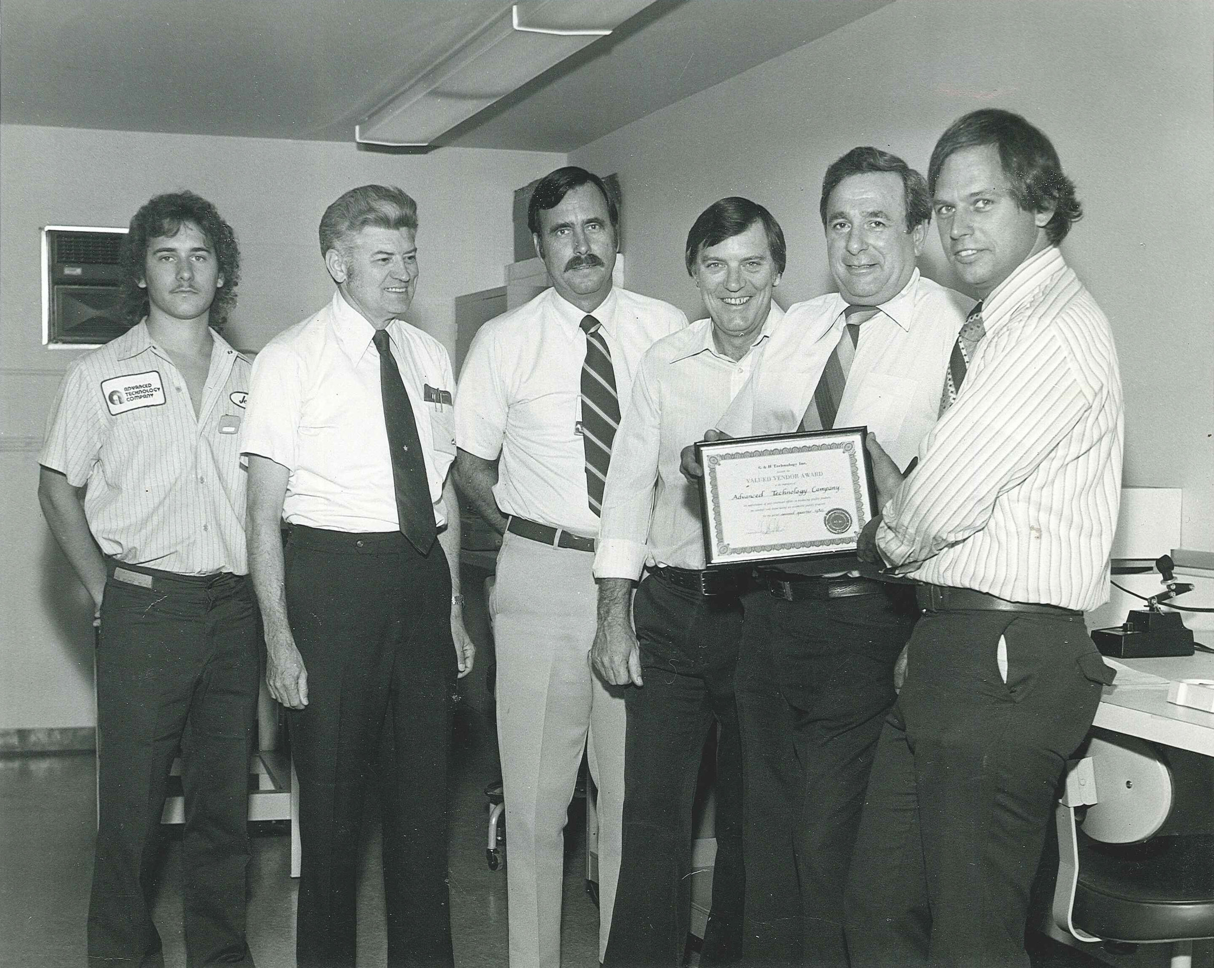  Pictured left to right: Jeff Lesovsky, ???, ???, founder Jay Frey, founder Bob DeSilvestri, and ???. circa 1980 