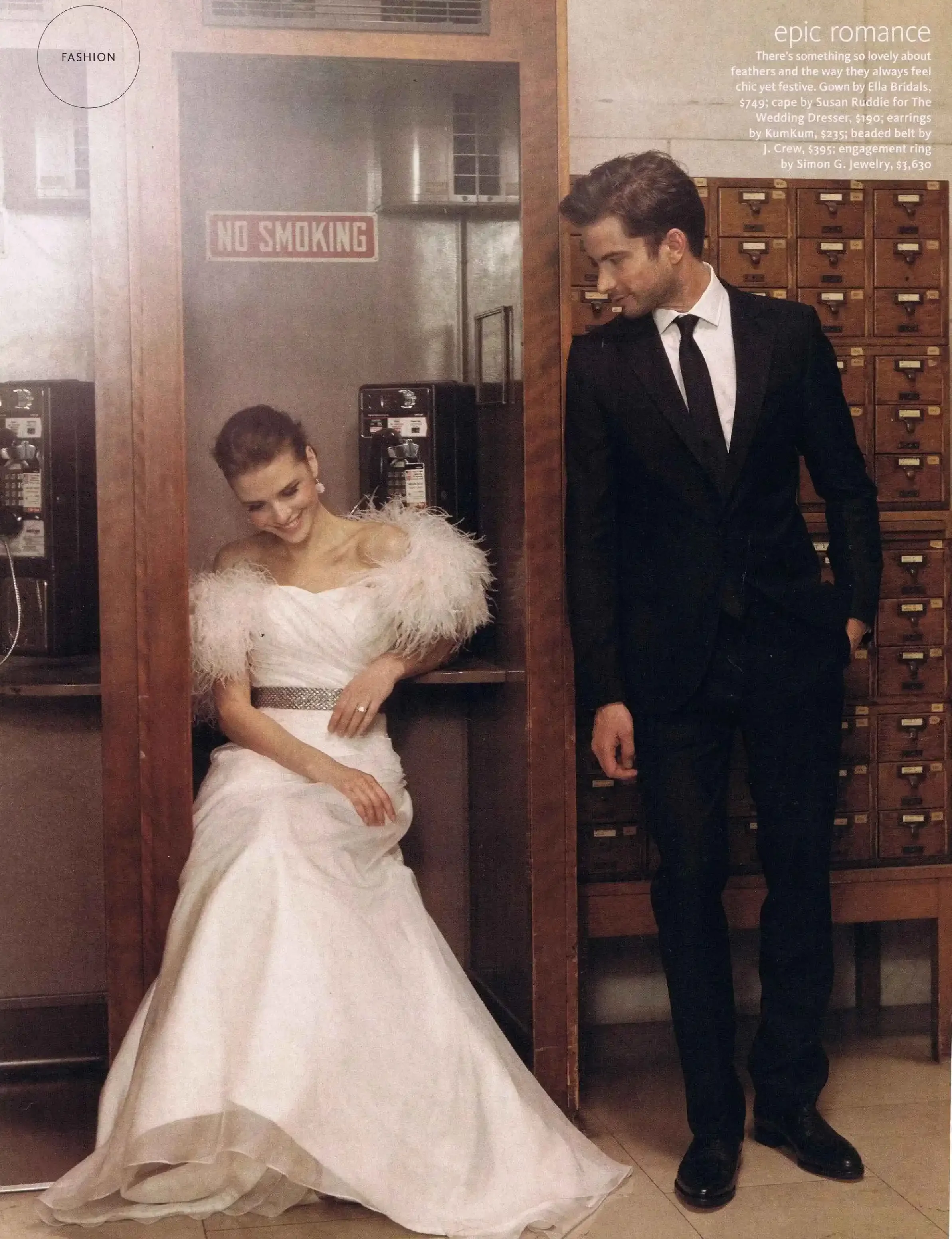 Bride in Feathered Gown and Groom in Black Suit.webp