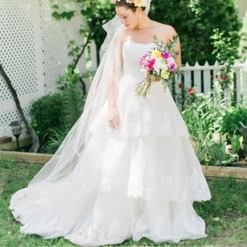 bride wearing a wedding dress with a custom skirt
