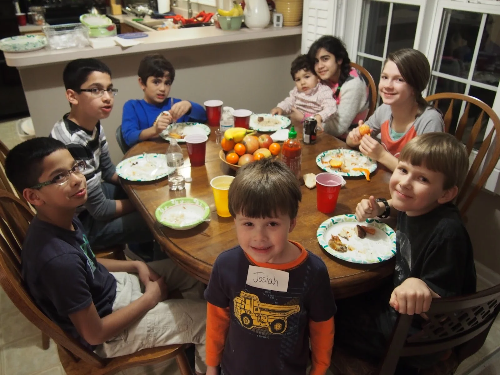 This is the kids' table at the Mosque/Church Dinner Club. In the past, I have said that we will know we are succeeding in our peacemaking work when Muslim and Christian children are playing together. In reality, however, our kids will lead the way for us if we let them!