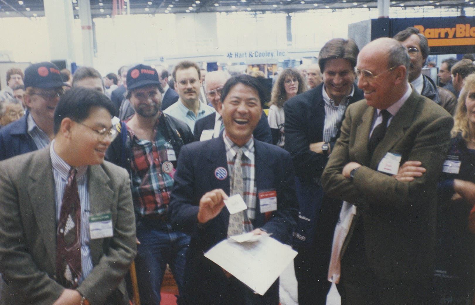 The Amazing Hondo's view of happy faces on a busy trade show floor. "The smarter the audience, the more fun to bamfoozle", says Hondo.