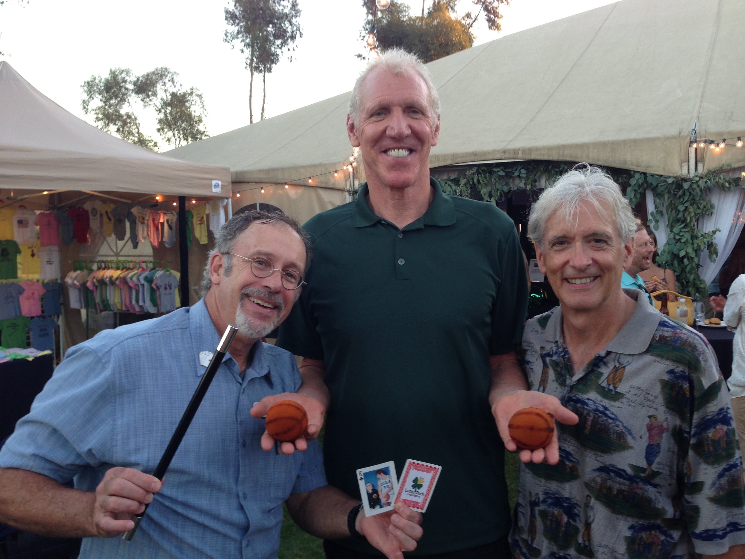 Hondo and friend Bill Fleischakker (the two short guys) with UCLA and NBA legend Bill Walton at the Lucky Duck Foundation golf benefit in Rancho Santa Fe, CA. Hondo kicked off the live auction with a stage show. Earlier he entertained the guests with his strolling close-up sleight-of-hand magic.