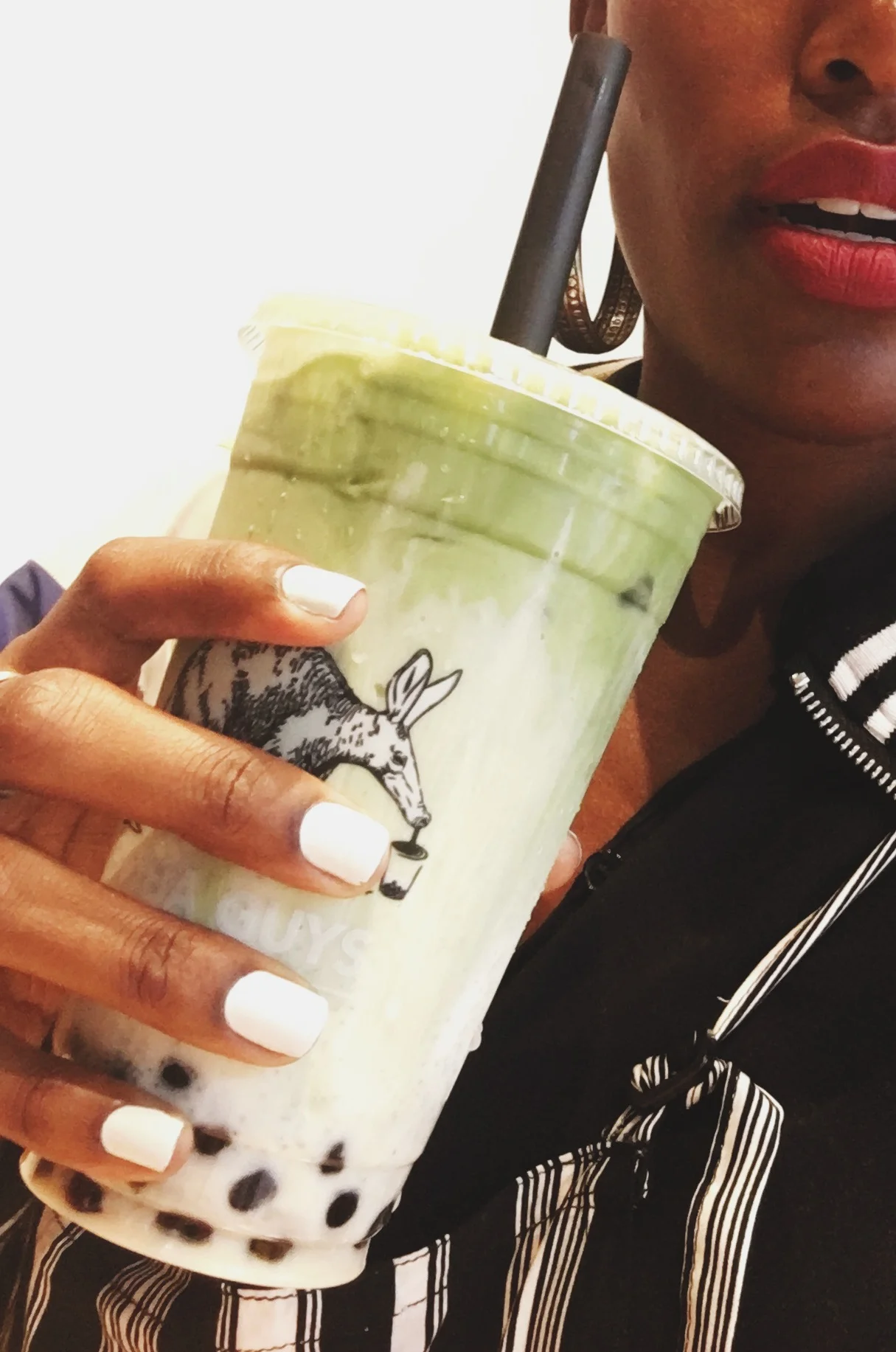 Josias's matcha latte w/tap.
