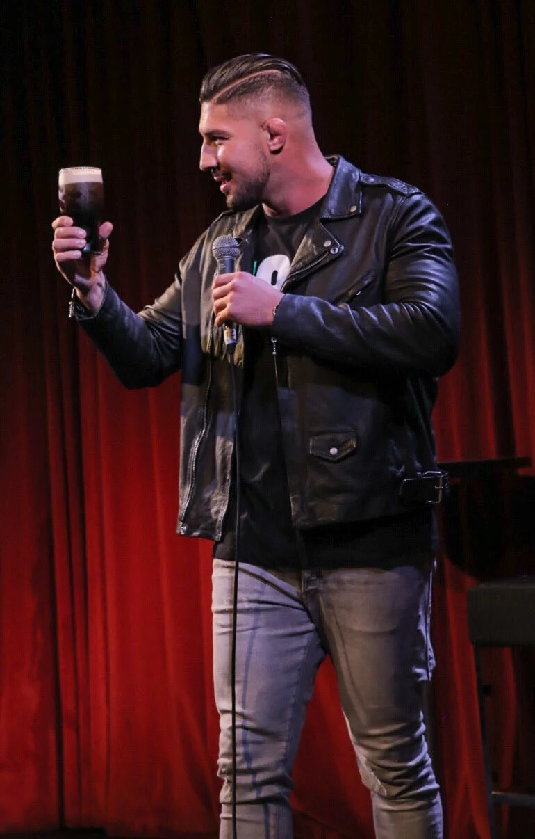 Brendan on stage enjoying the Dublin crowd and of course a Guinness!