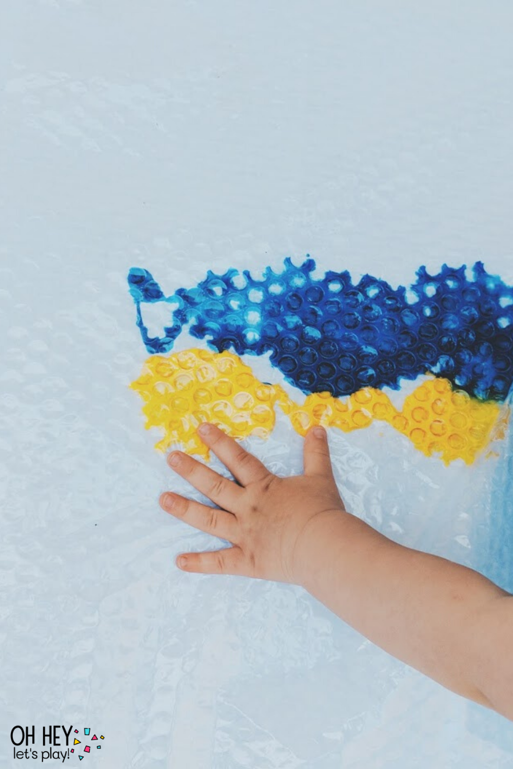 Bubble Wrap Sensory Paint 2 30+ Activities for 1-2 Year Old Toddlers - Oh Hey Let's Play www.ohheyletsplay.com.png