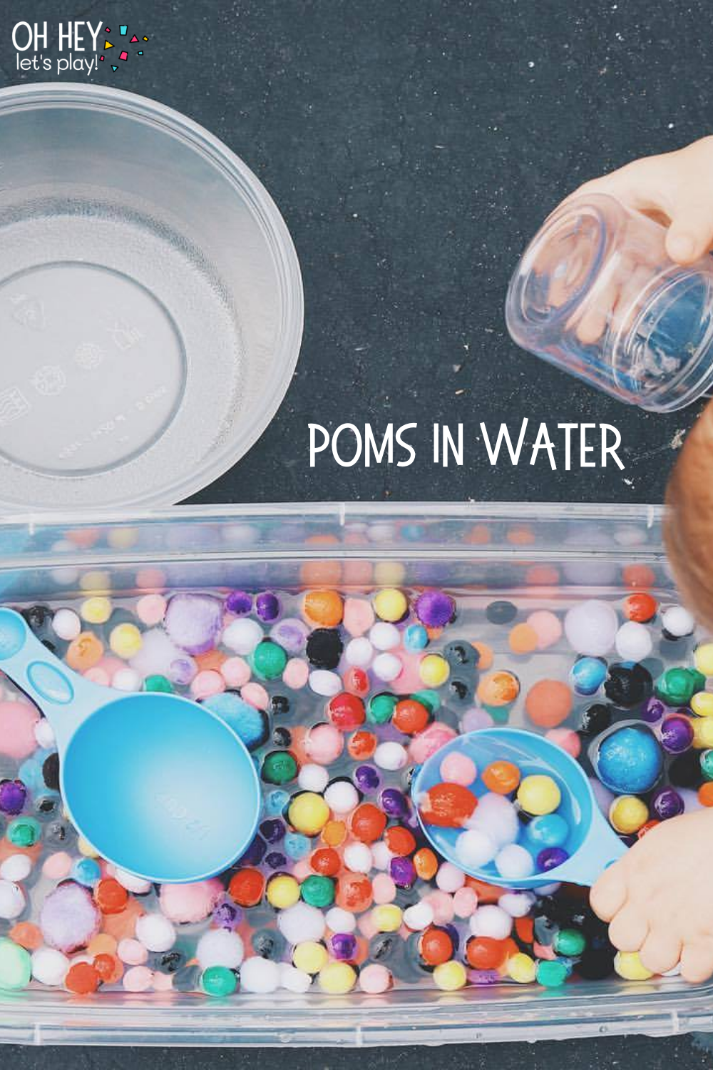 Poms in Water 30+ Activities for 1-2 Year Old Toddlers - Oh Hey Let's Play www.ohheyletsplay.com.png