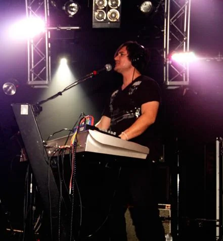 Performing on stage with my band, circa 2009