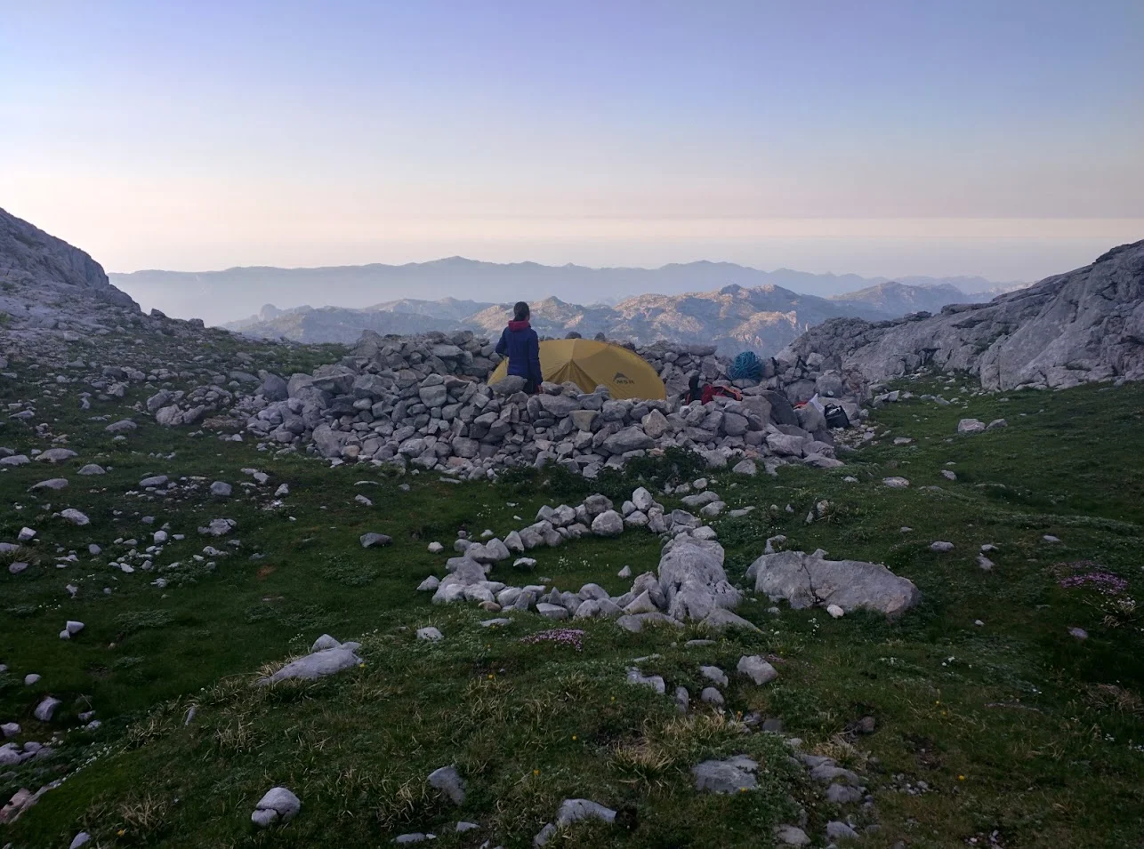 No camping (officially) allowed - but there's perfect, rock ringed tent pads.
