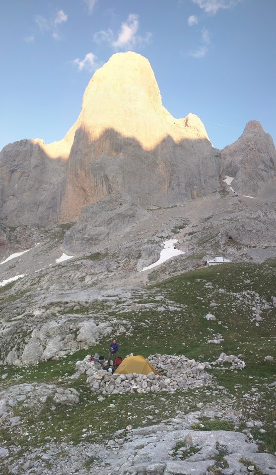 Our campsite below the Naranjo de Bulnes - the refugio is the white building to the right. Cold beer was 2.50€.