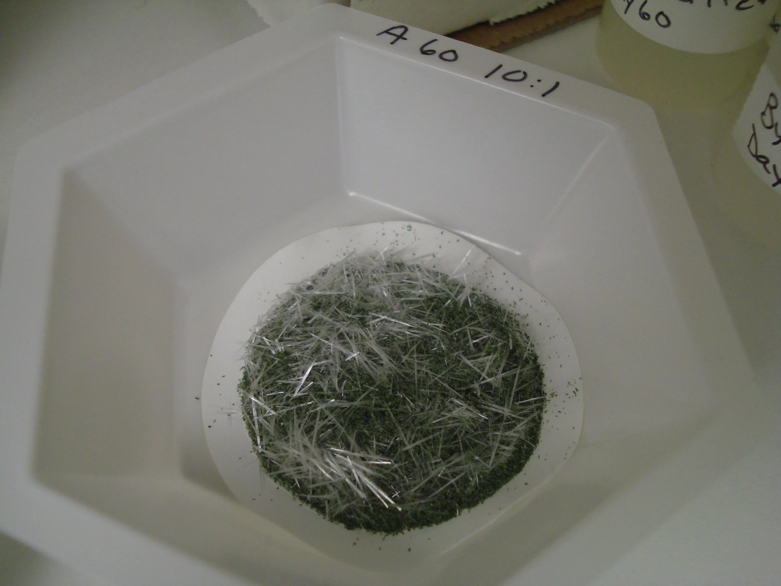 The most dominant secondary minerals formed were Ca-sulfate, either anhydride or the hydrated form gypsum. The macroscopic crystals took needle-like forms (different lengths and thicknesses) and dried white.