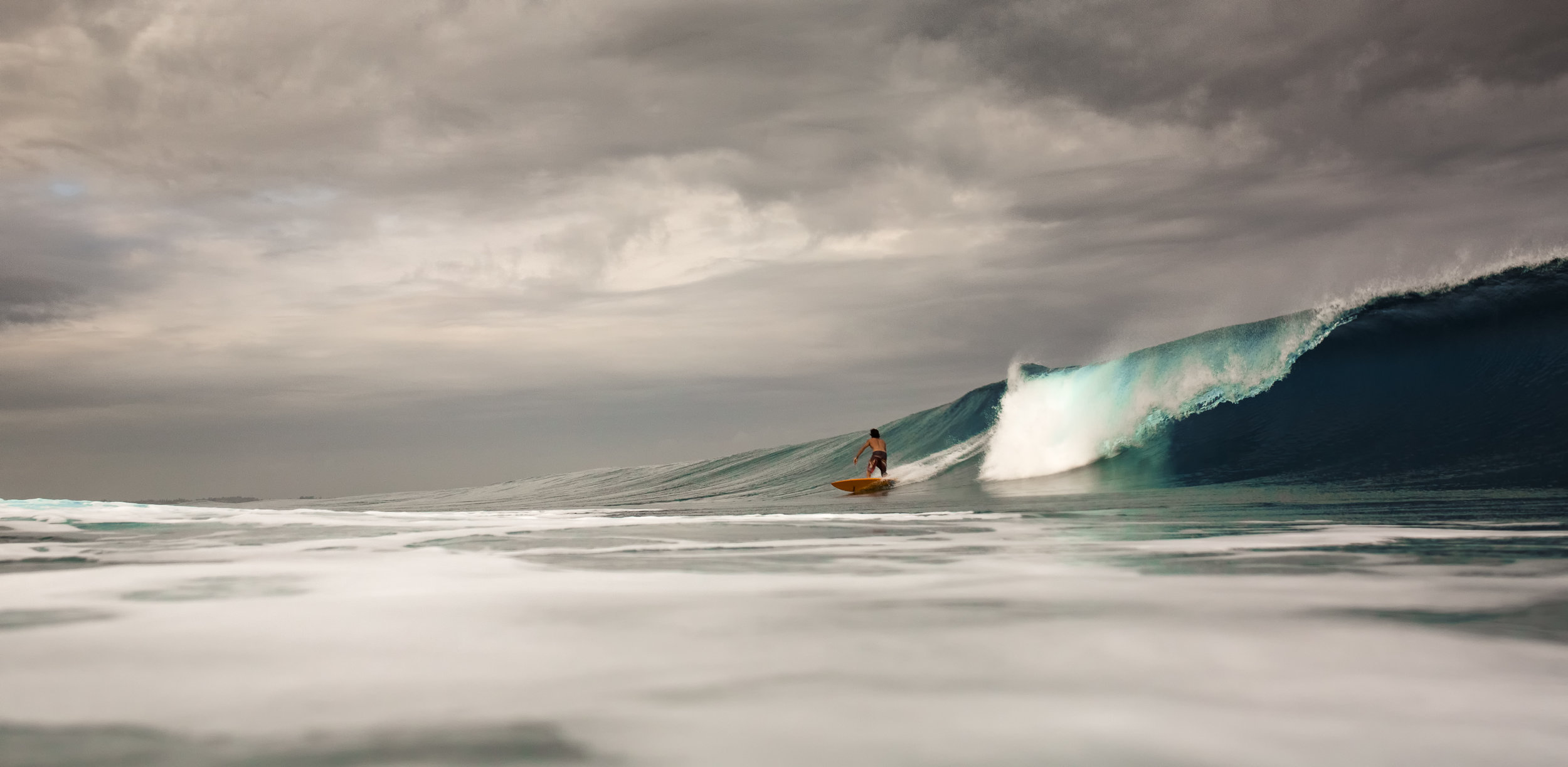 Frank Gonzalez rides one of few perfect right waves. Photo by Marco Brava.
