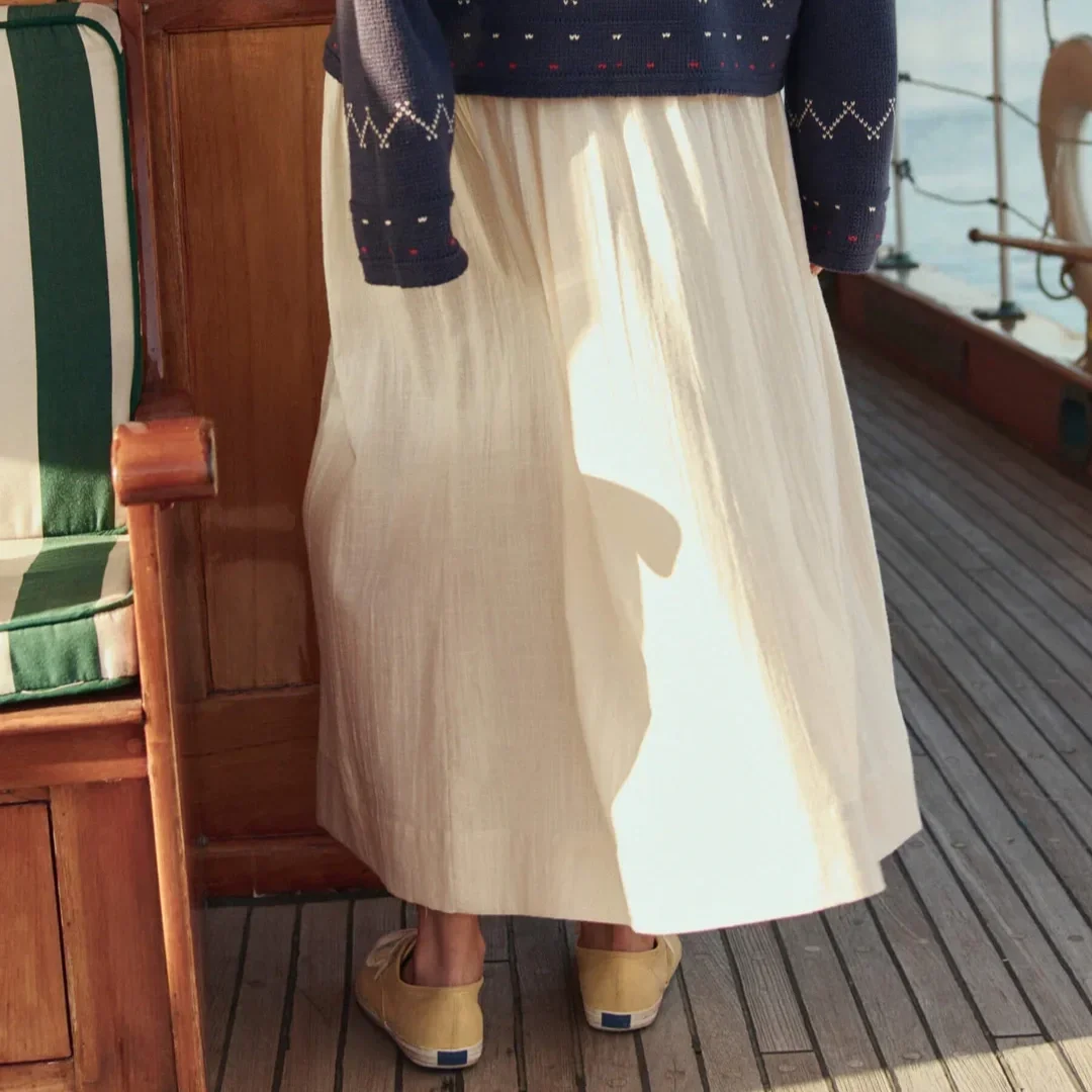 THE-GREAT-LOOK-53-THE-FISHERMAN-LACEUP-PULLOVER-NAVY-THE-VIOLA-SKIRT-NATURAL-04080_1_1080x.webp