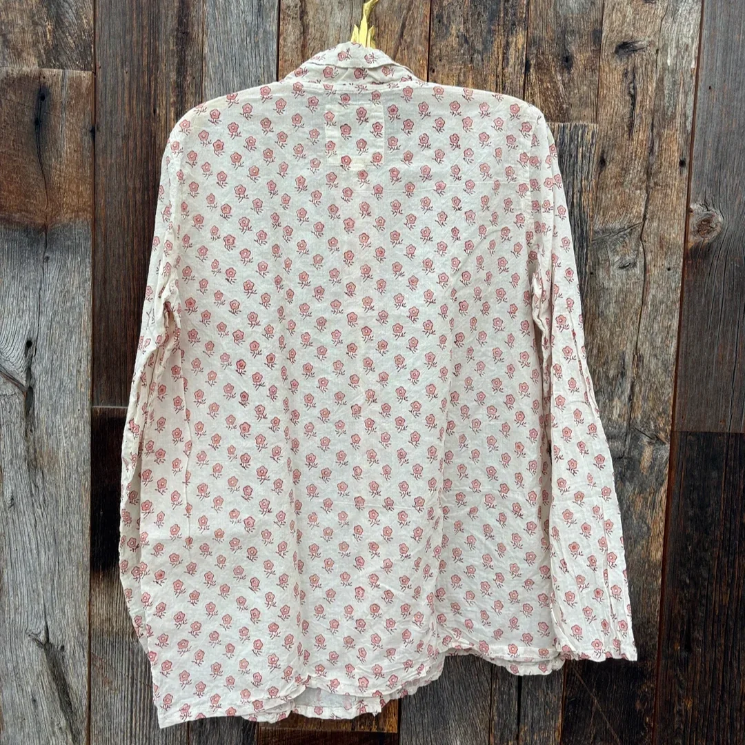 auntie-oti-posey-shirt-back.webp