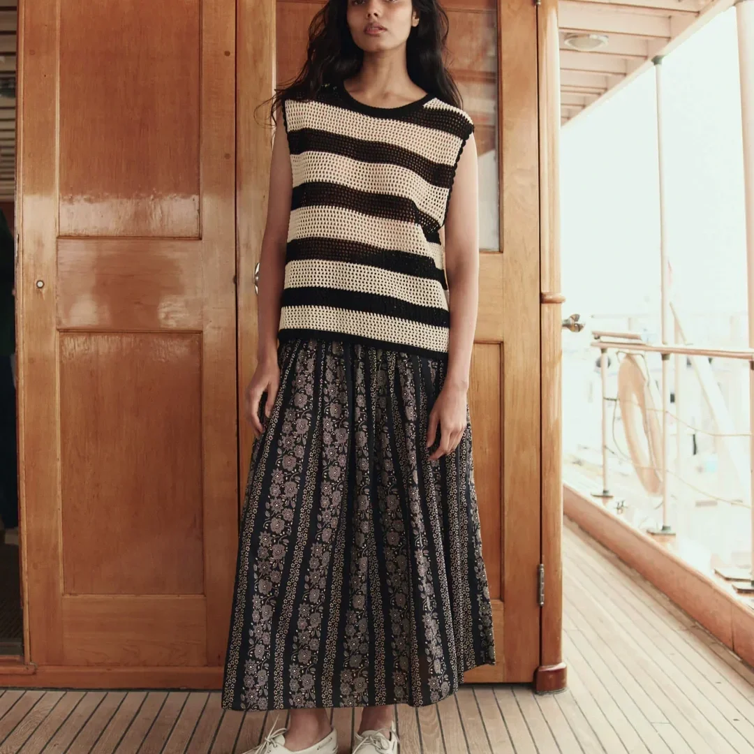 THE-GREAT-LOOK-1-THE-CROCHET-SWEATER-SHELL-BLACK-AND-CREAM-THE-CANARY-SKIRT-BLACK-AND-CREAM-TOKEN-FLORAL-00087_2a60ef5d-2fcd-4d07-8d55-9857e572f7a9_1080x.webp