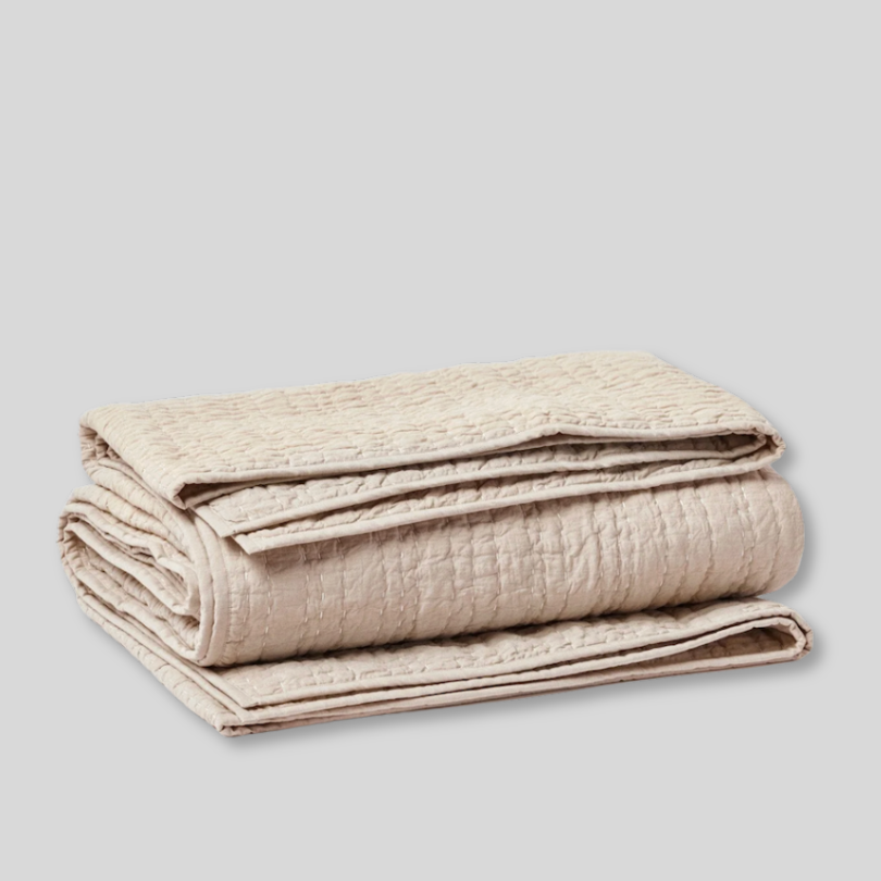 coyuchi-pebbled-handstitched-quilt-hazel-chambray.png