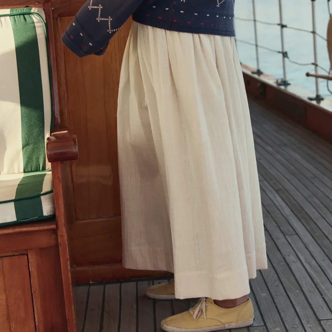 THE-GREAT-LOOK-53-THE-FISHERMAN-LACEUP-PULLOVER-NAVY-THE-VIOLA-SKIRT-NATURAL-04064_1_1080x.webp