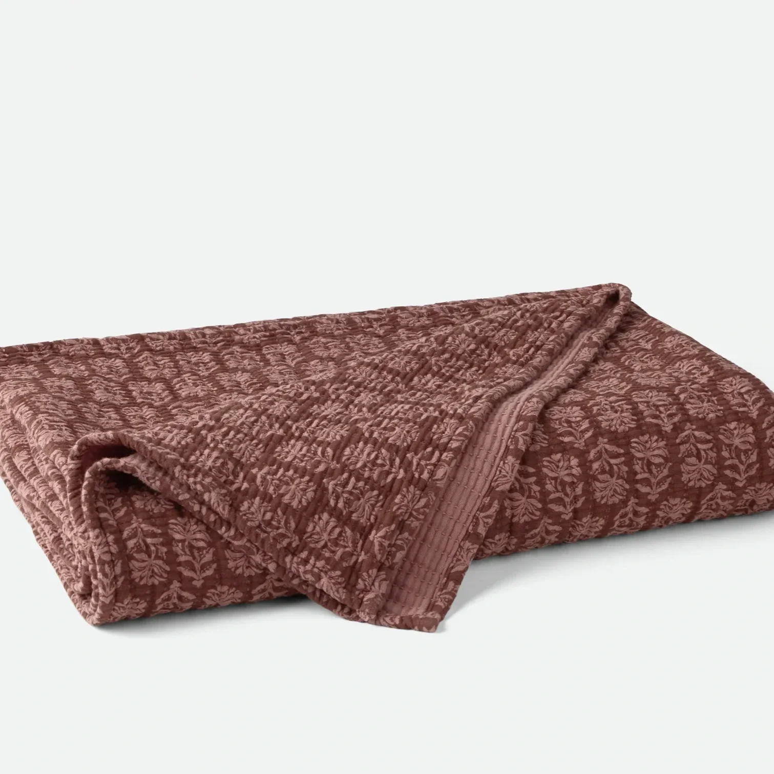 FA26_MiradaOrganicMatelasse_Blanket_PlumBlossomChrysanthemum_0239_d2d72857-ada8-440d-af4e-026964f2589f.webp