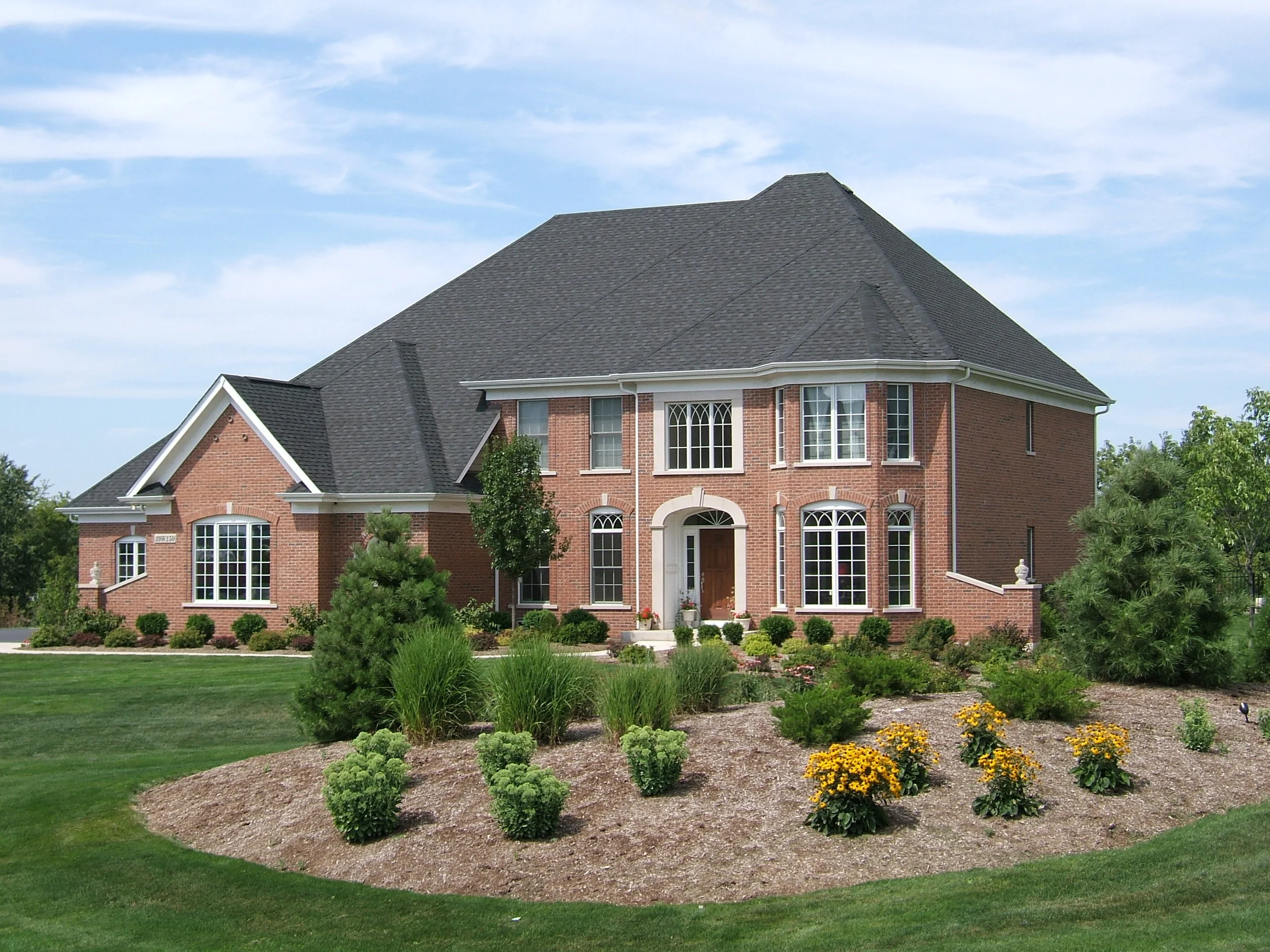 Burr Hill St. Charles IL 60175 Custom Home by Southampton.  Custom Limestone and Two Story Bay Window