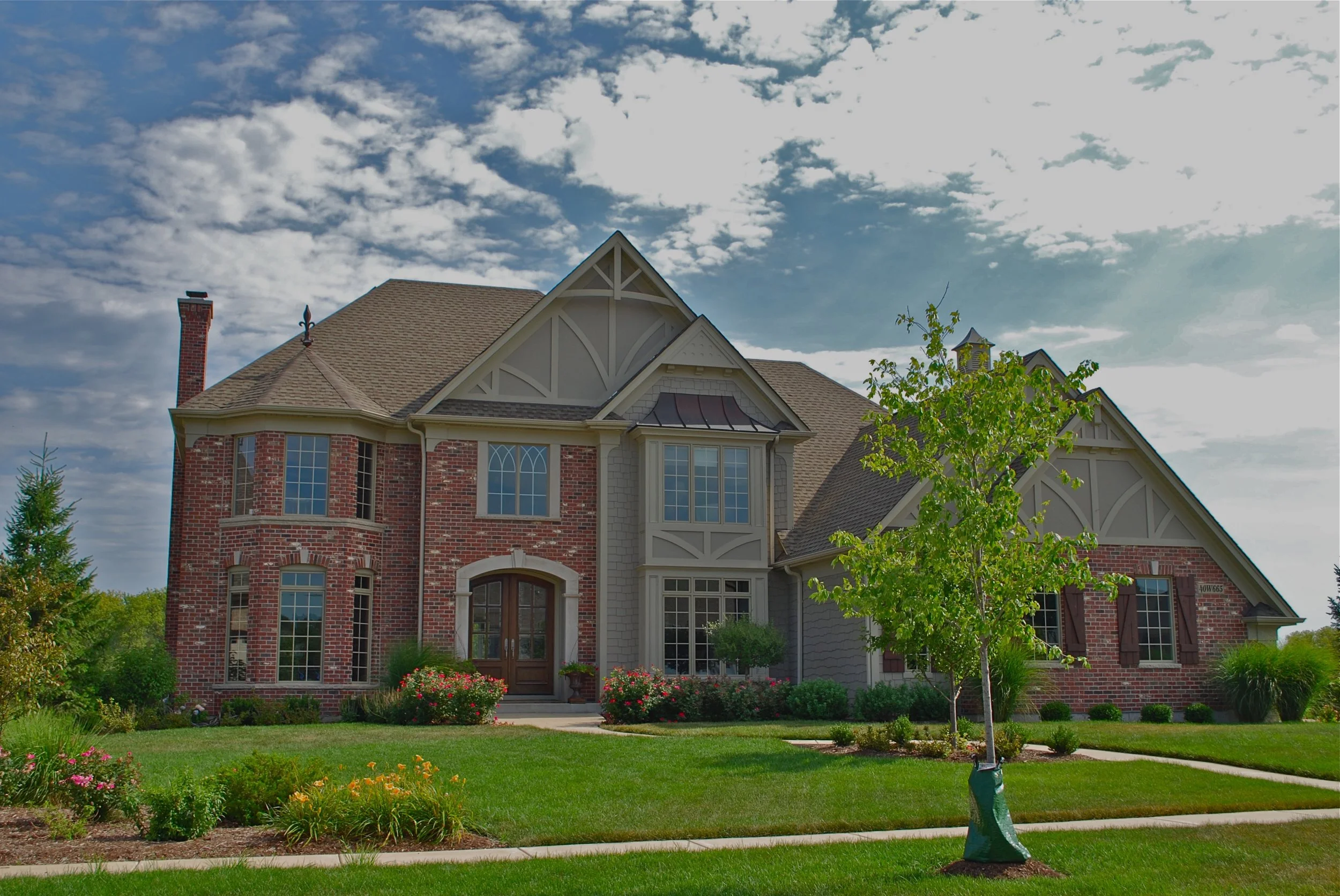 Custom Fox Creek Home by Southampton in St. Charles IL 60175.  Custom Exterior with Brackets and Finials. 