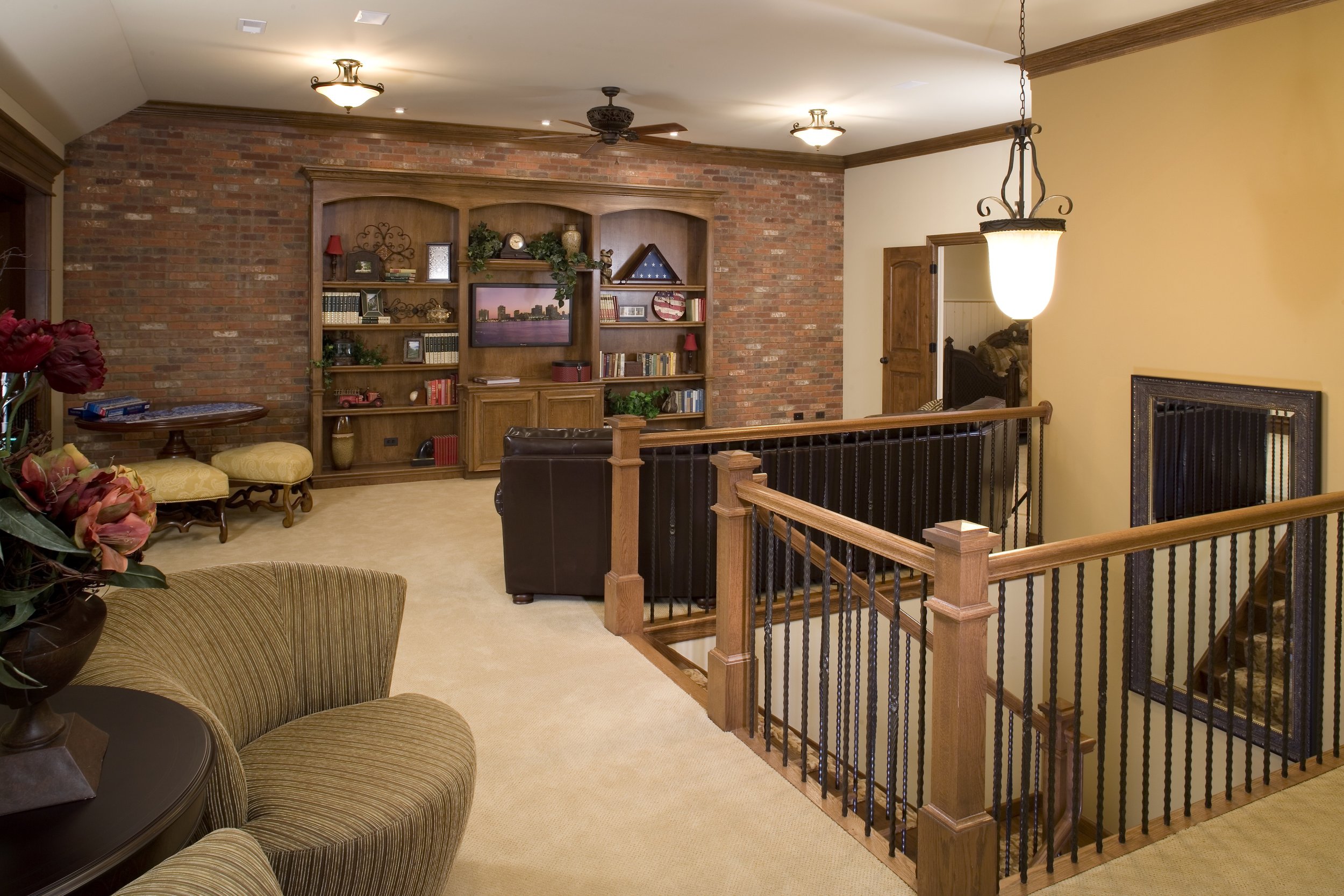 Faux Brick Wall with Book cases in this Loft Remodel in St. Charles IL