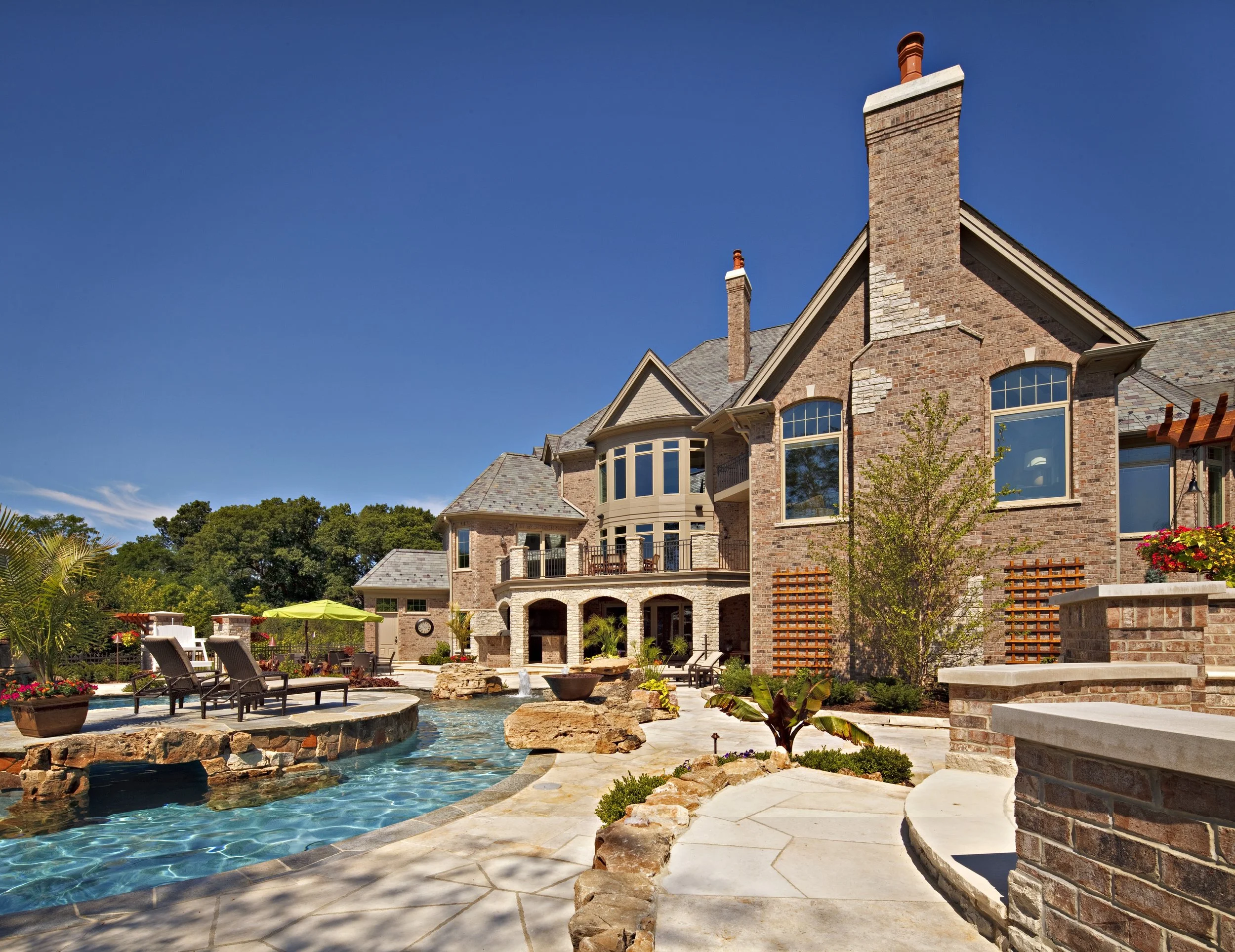 Custom Fire Pit in Geneva IL. Custom House and Pool by Southampton Builders. Geneva IL 60134