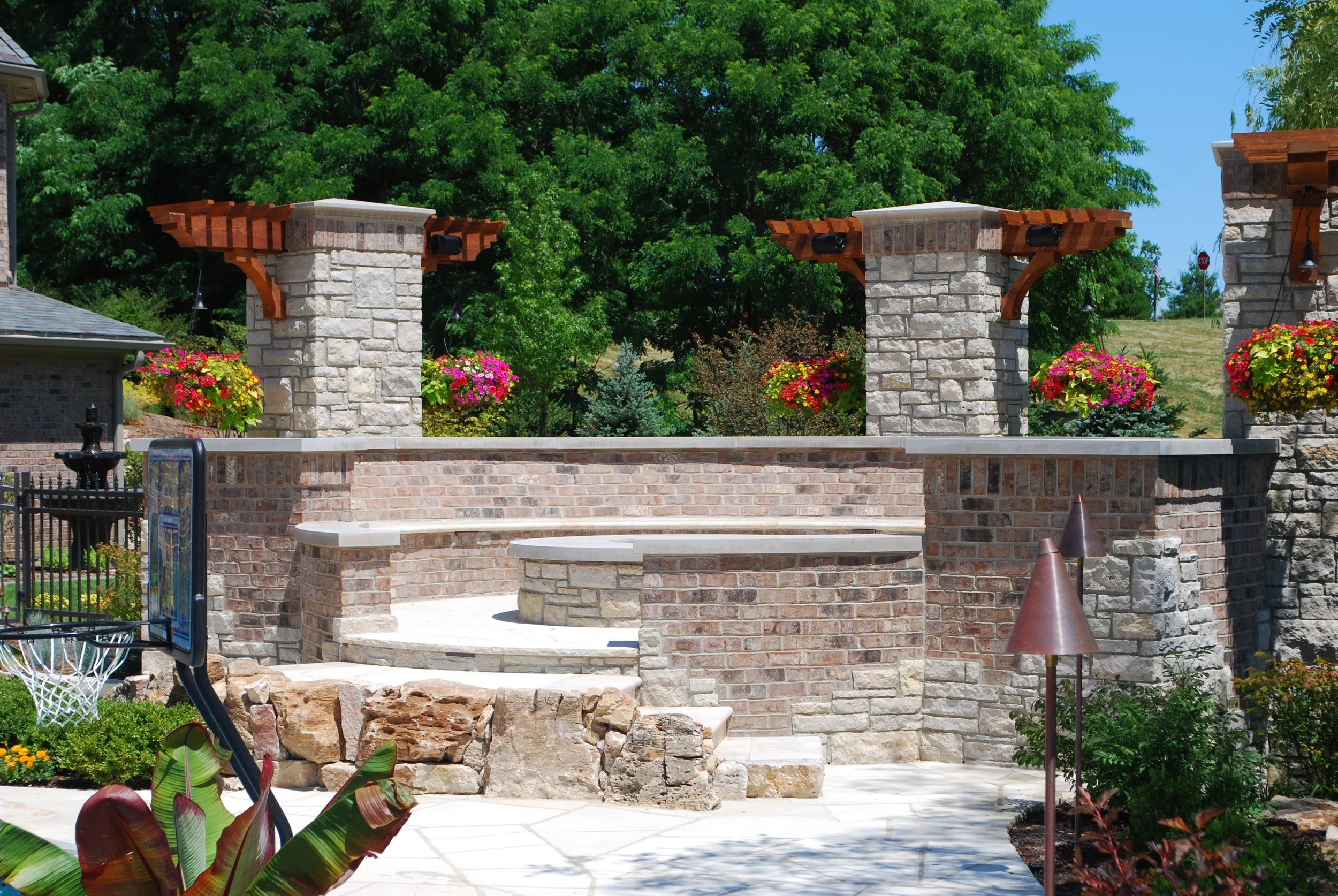 Stone Outdoor Fireplace with Pillars.  Amazing Firepit in Geneva IL. 60134. Southampton Builders