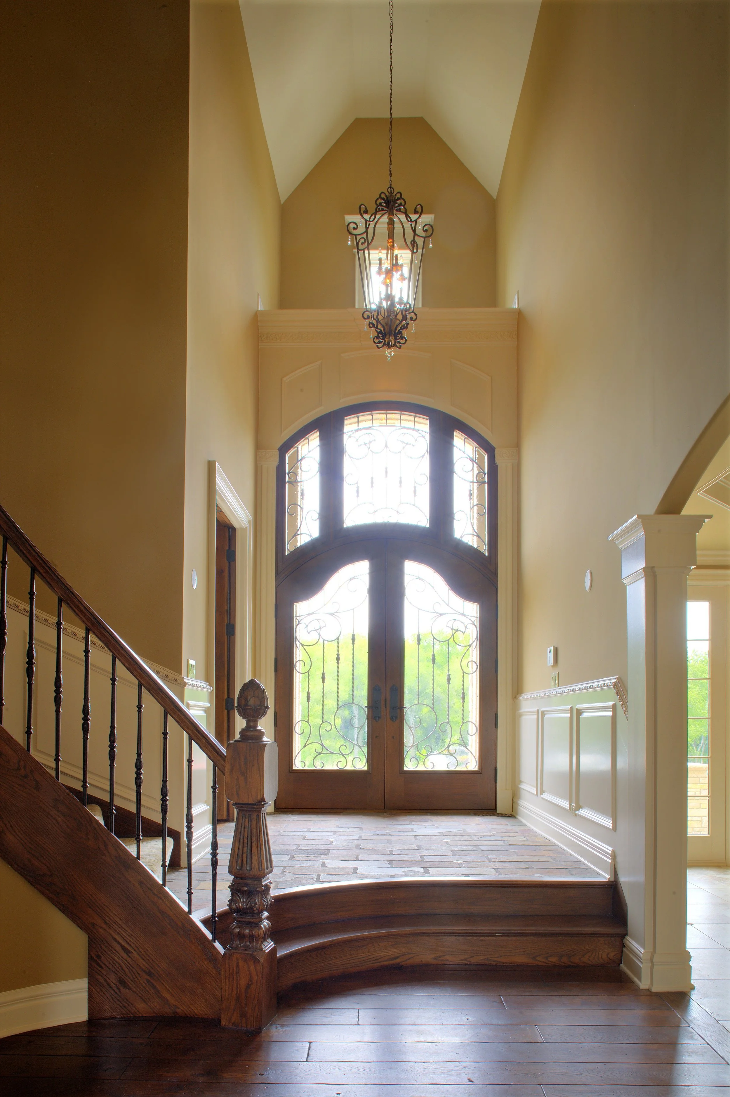 ELEGANT SOARING FOYER IN THIS CUSTOM CASTLE FOYER