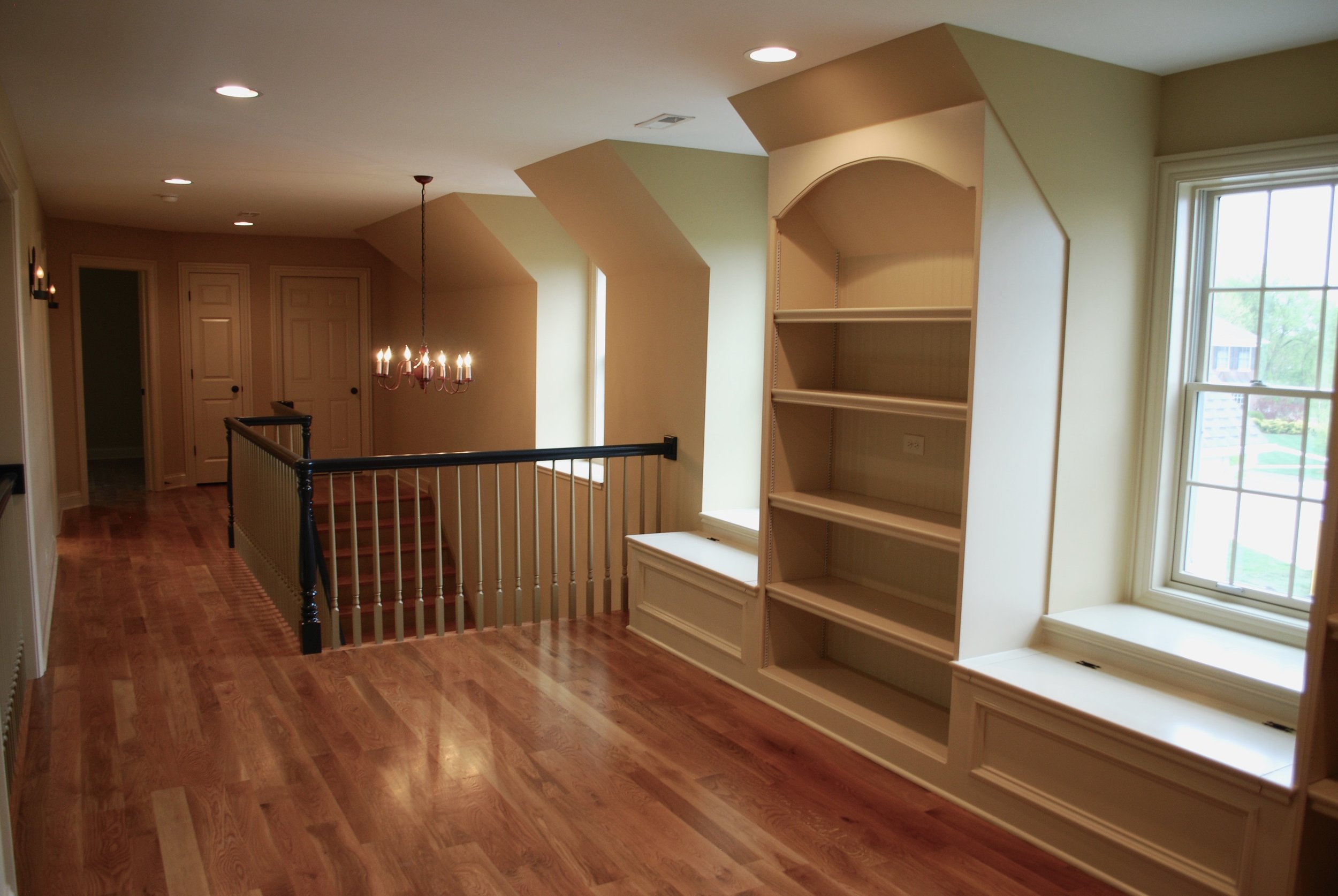 Built in Book Cases in this Custom Home Loft 