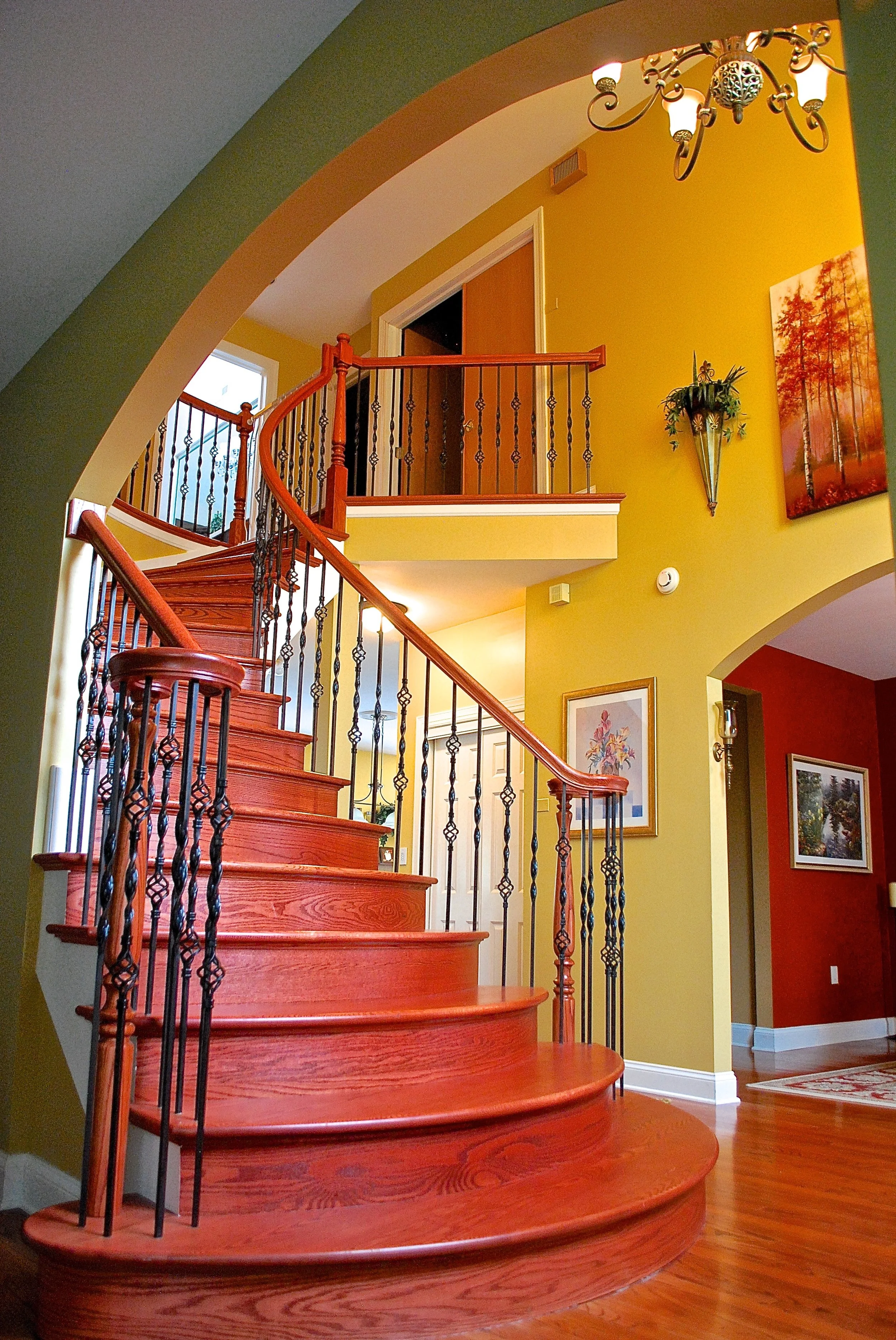 FOYER REMODELING IN ST. CHARLES IL. NEW STAIR CASE, FRONT DOOR &amp; LIGHTING.