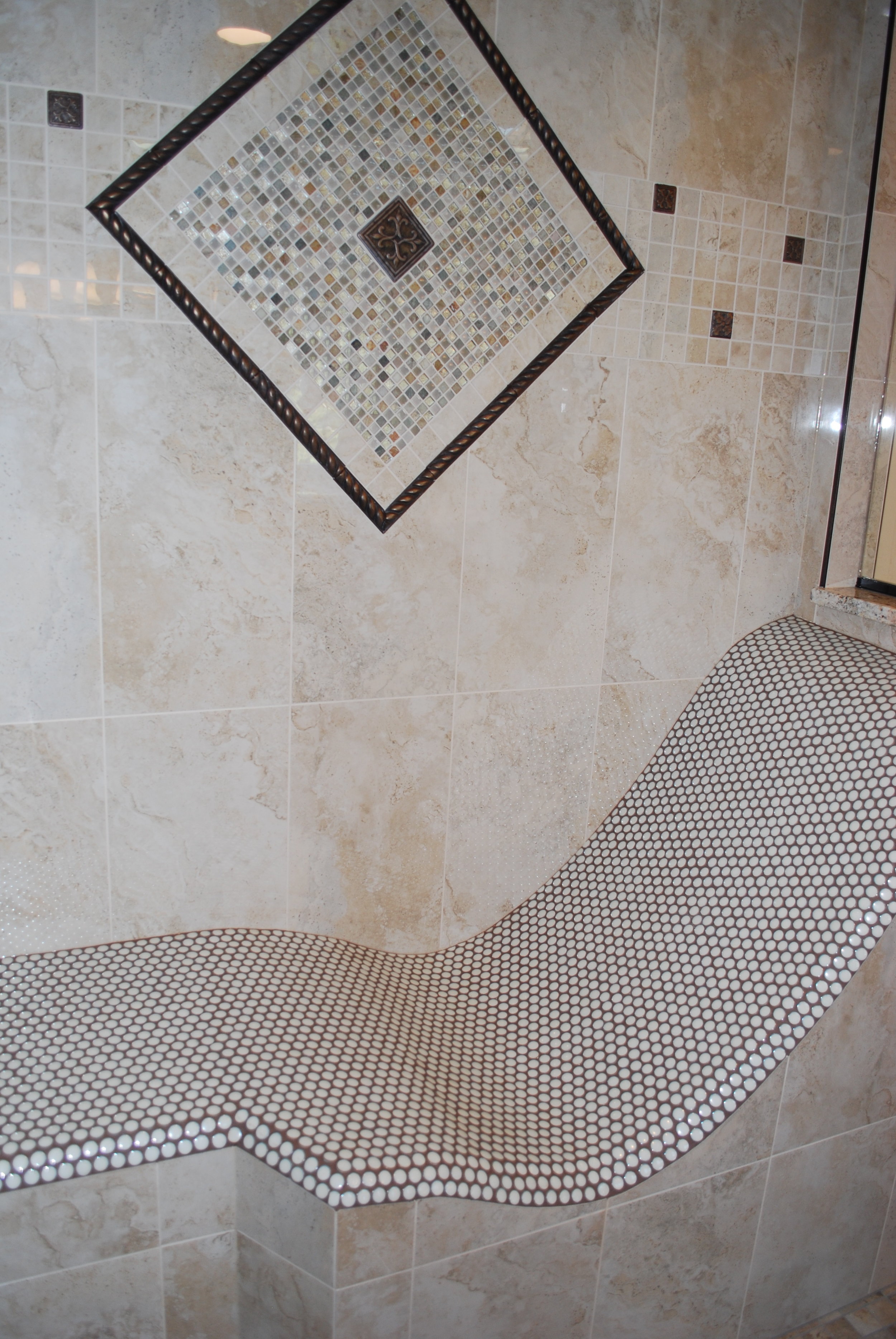 CUSTOM TILE WORK IN STEAM SHOWER WITH BENCH