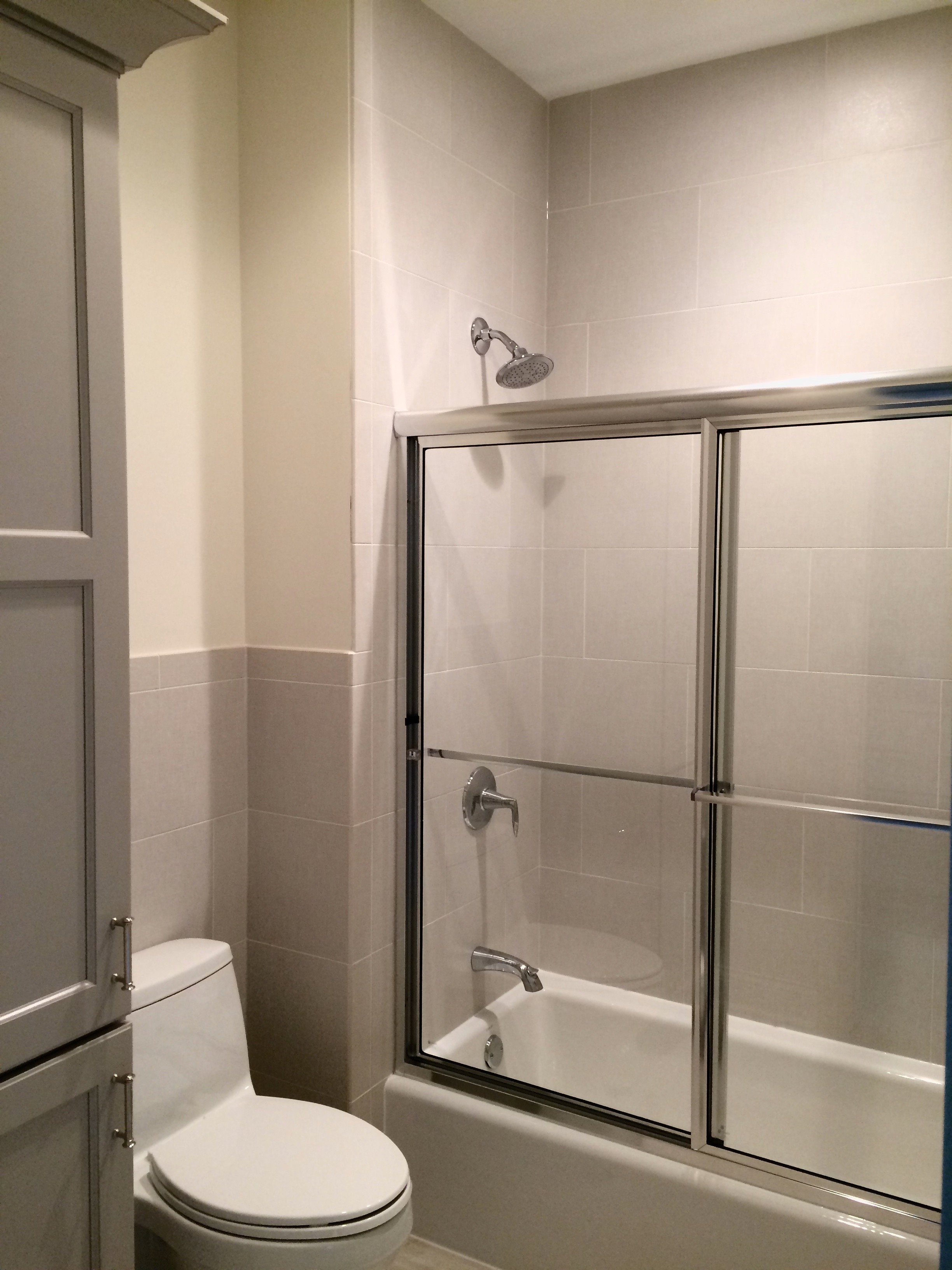 SHARED BATHROOM REMODEL WITH TALL LINEN CLOSET IN GENEVA IL