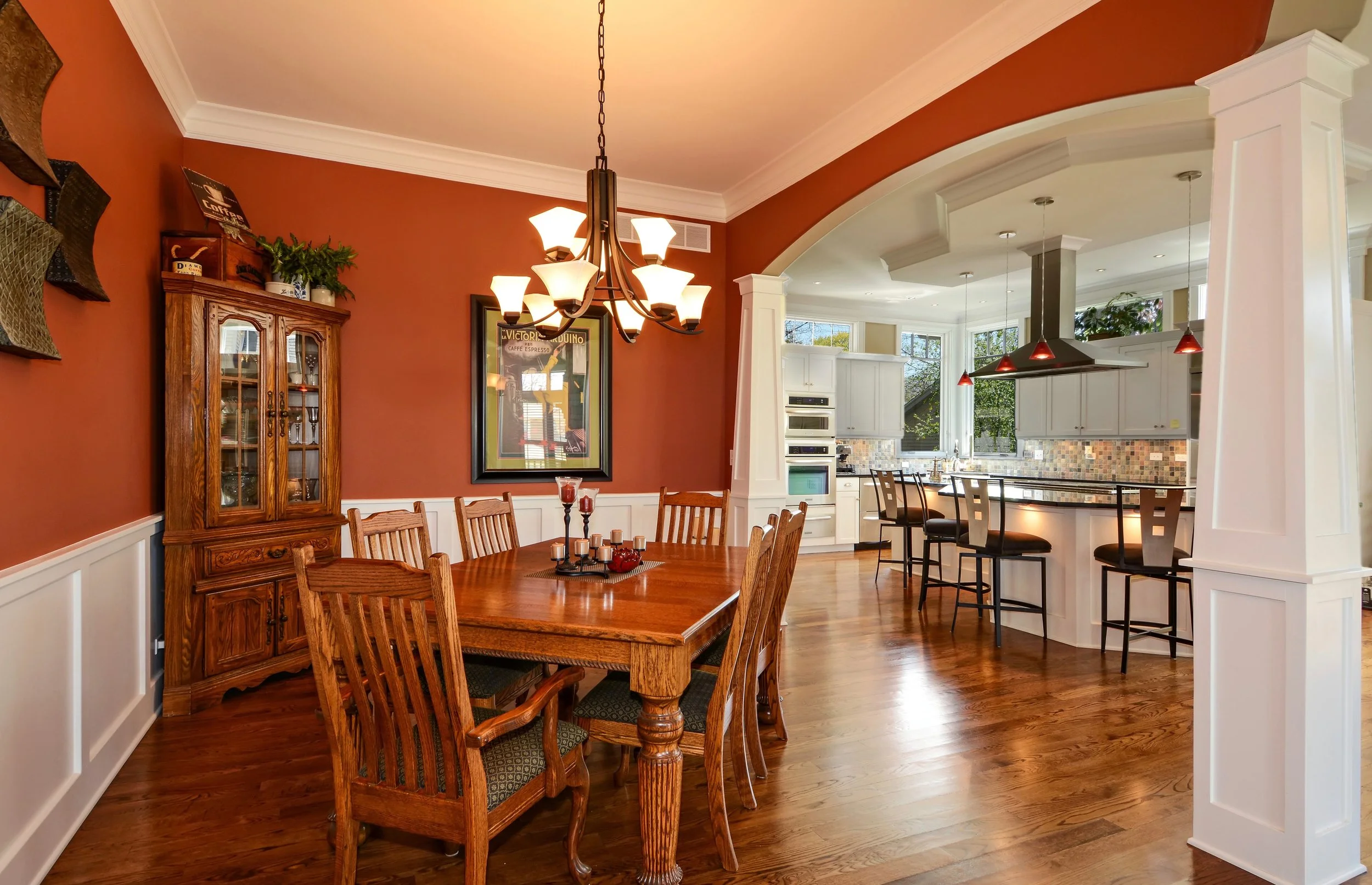 ARCHED DINING ROOM VIEW INTO KITCHEN