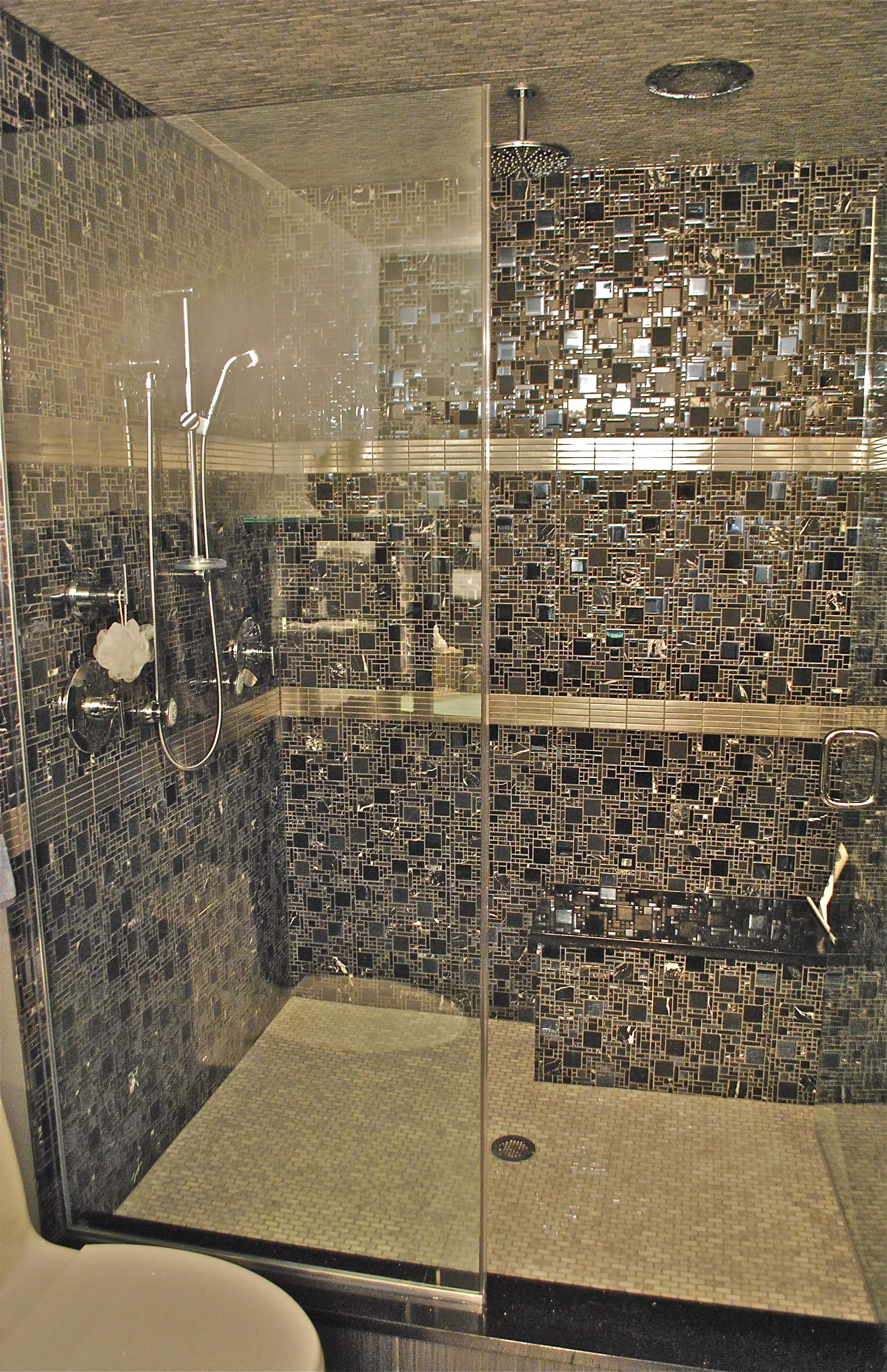 WALK IN SHOWER WITH DARK MOSAIC TILE
