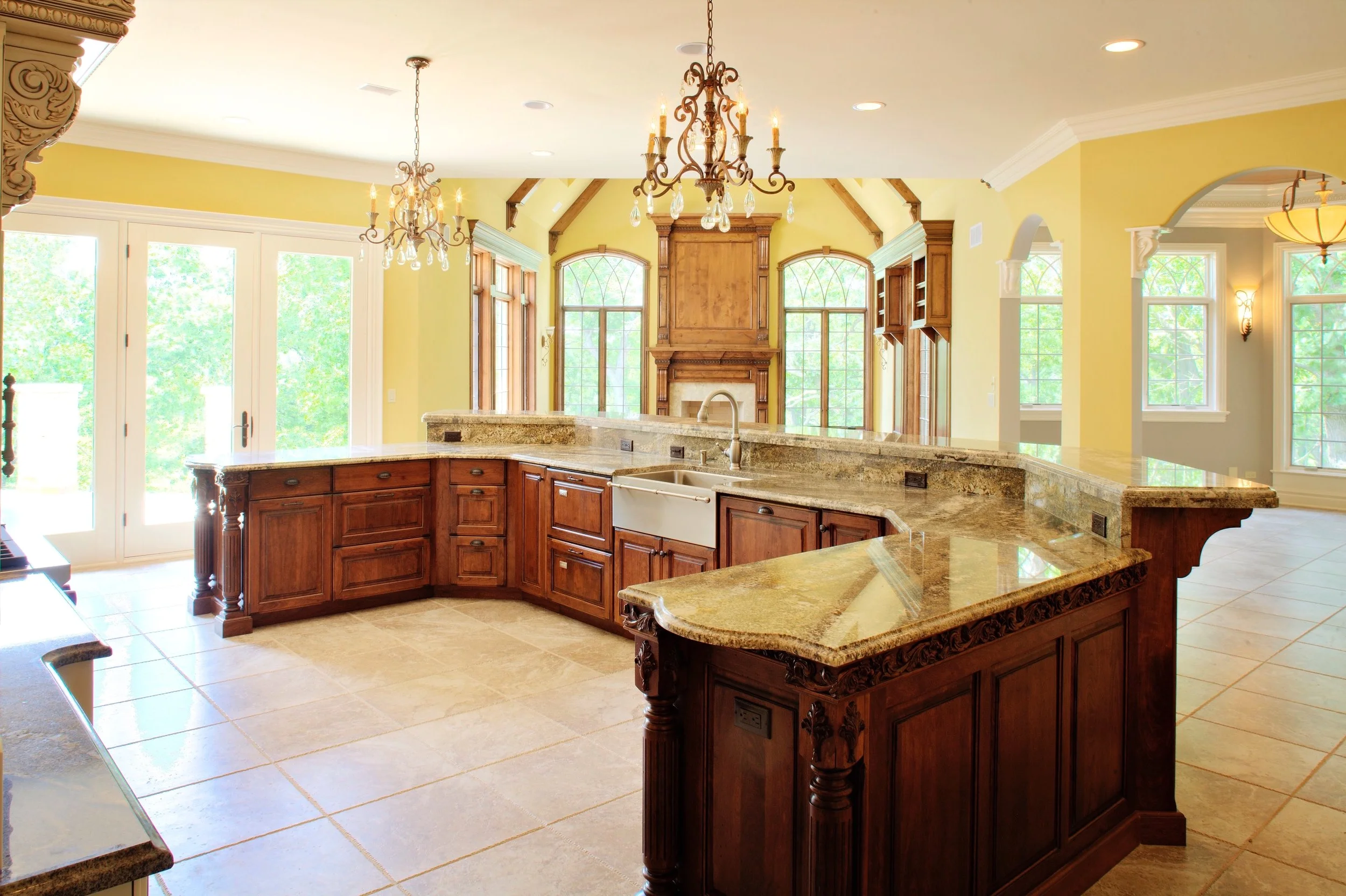 Stainless Apron Sink.  Knotty Alder Fireplace.  Reeded Island Legs.  Custom Kitchen in Woodstock Illinois