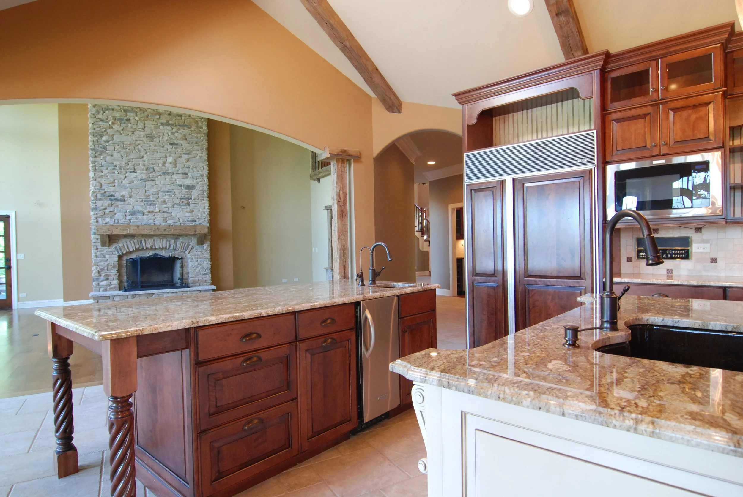Stacked Stone Fireplace Remodel in this Oak Brook Custom Home