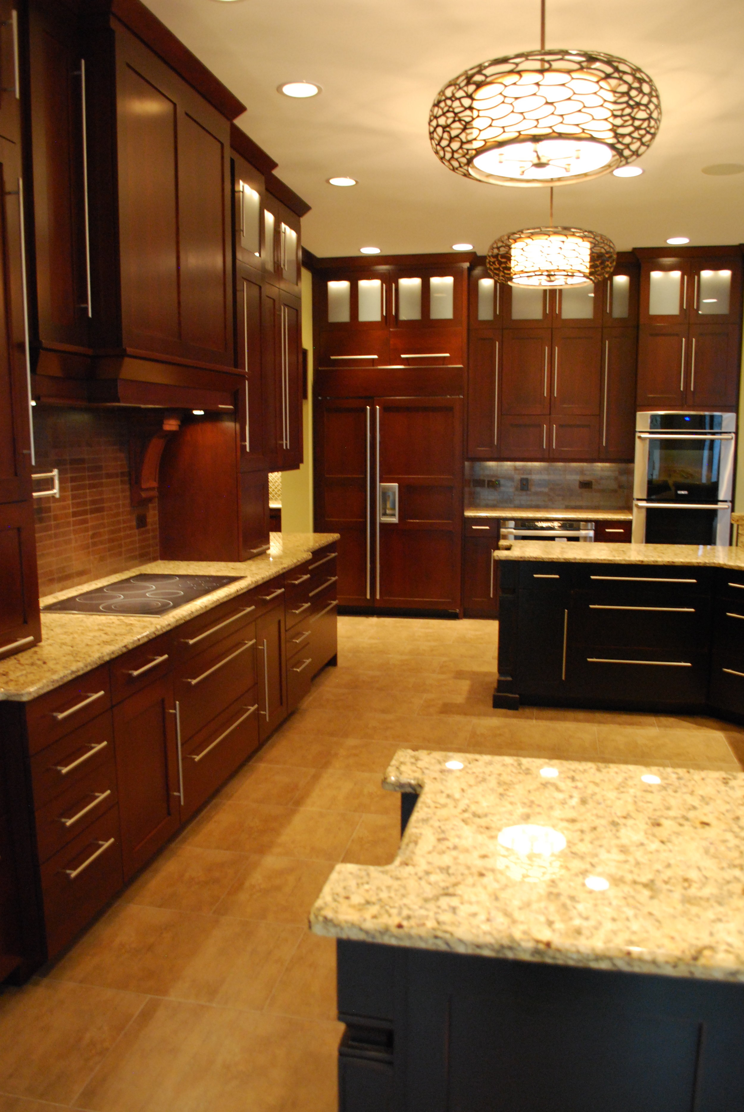 Transitional Black &amp; Cherry Kitchen with Light Granite Counters in this Naperville IL. Kitchen Renovation Project. 