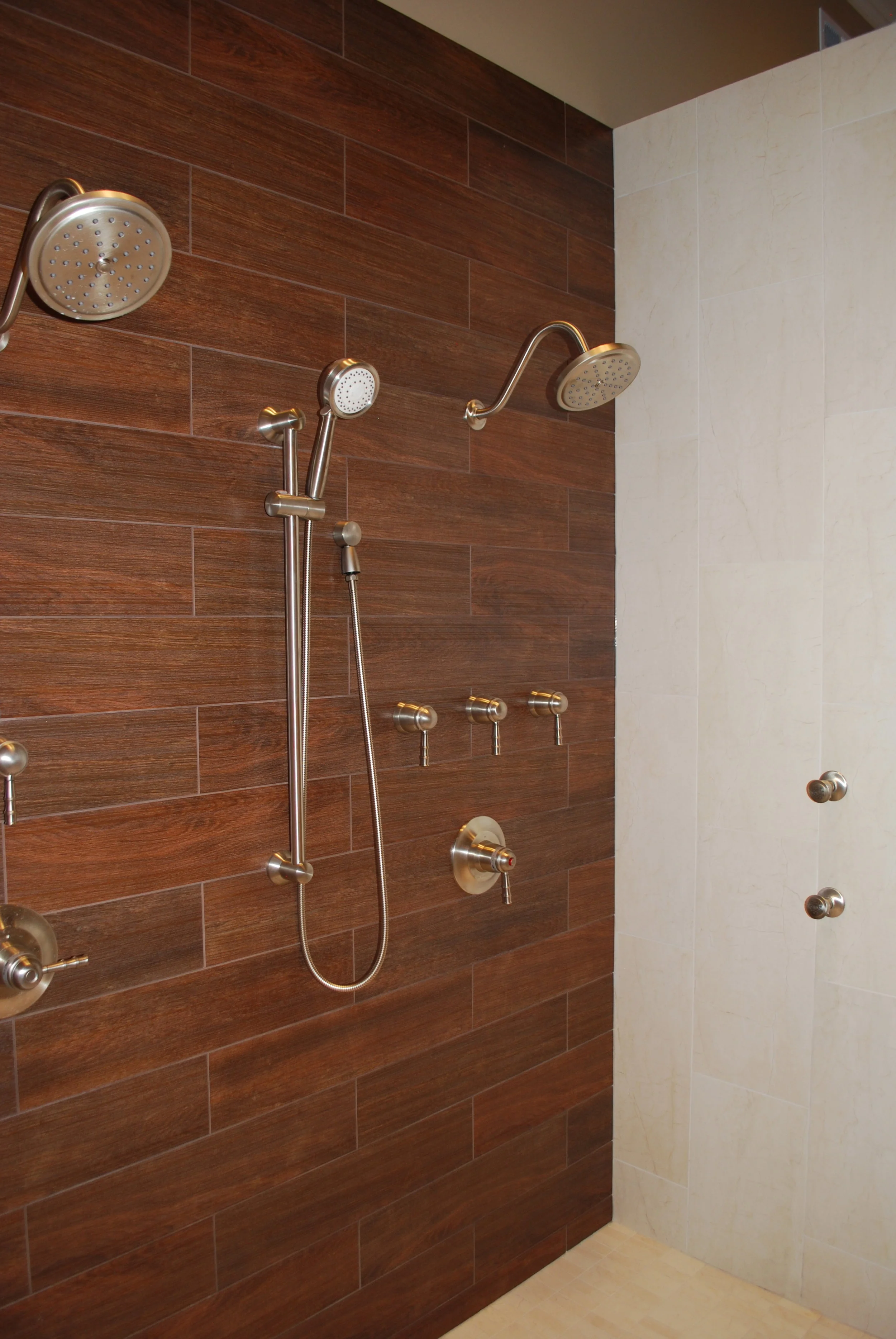 Hardwood Tile in Shower With Body Sprays & Handheld