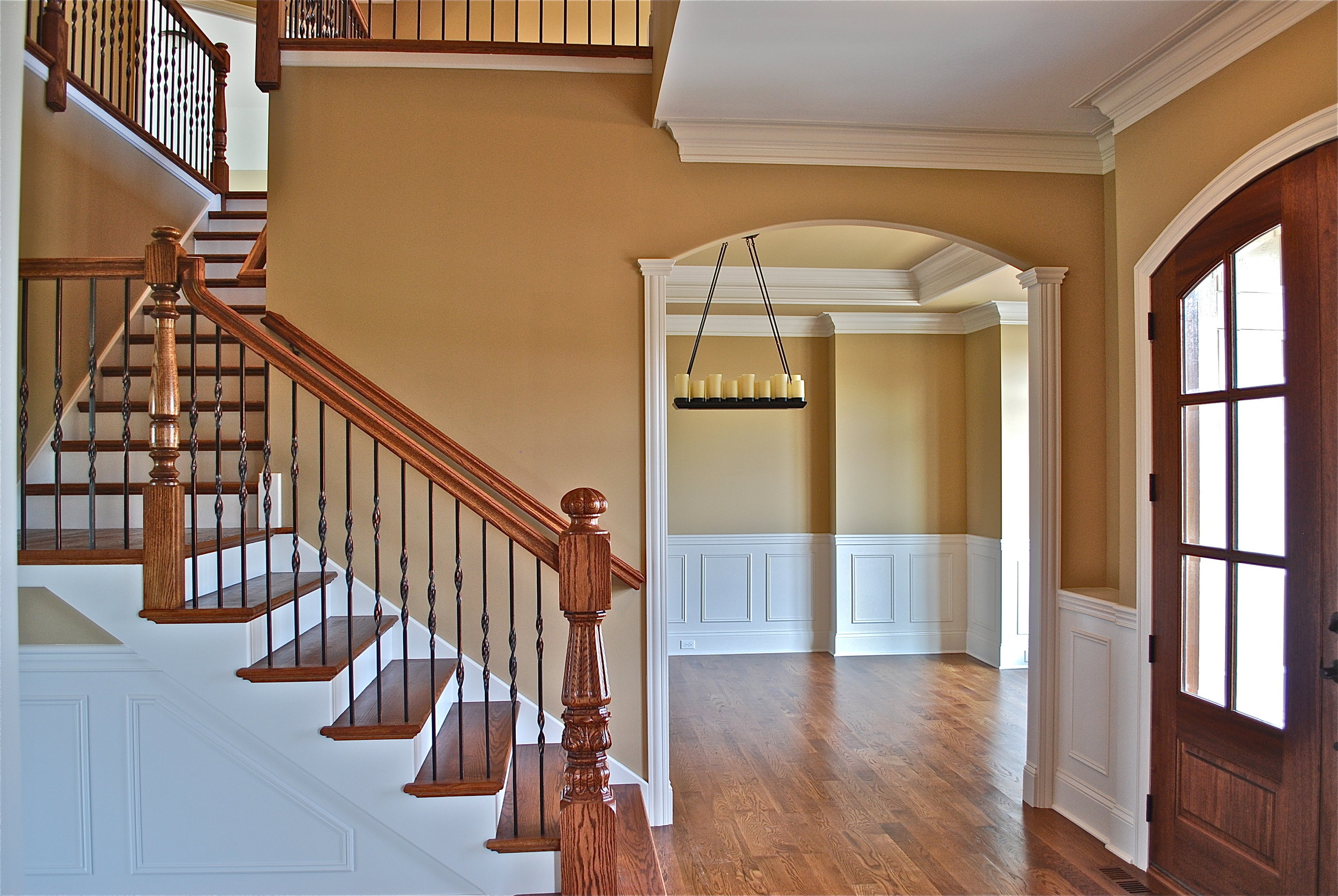 Arched Pella Wood Front Doors &amp; Custom Stair Case