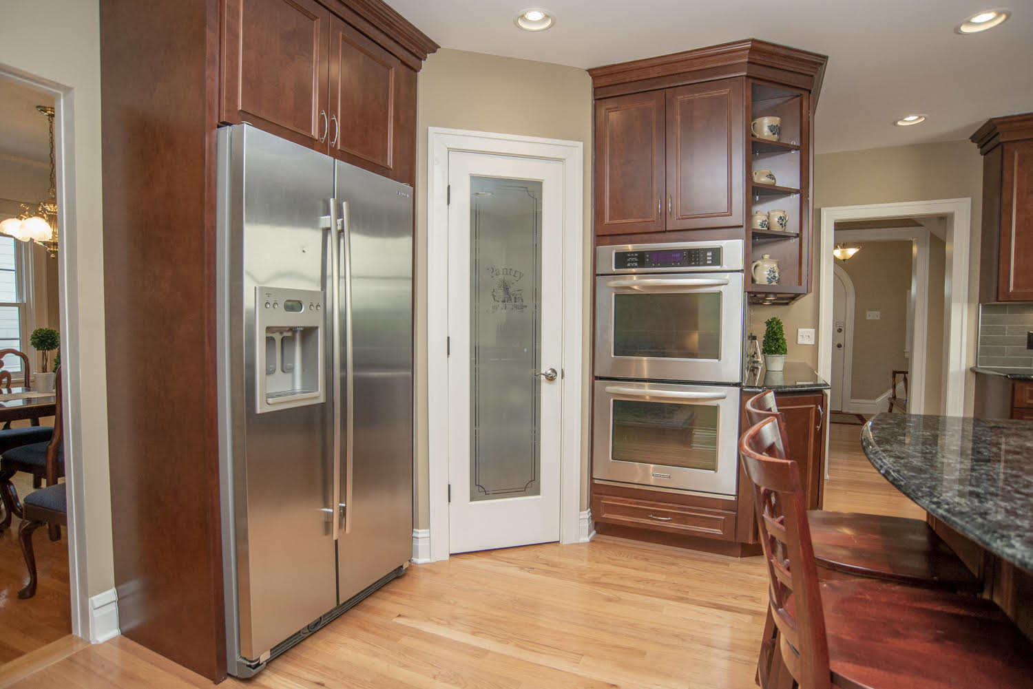 THIS WALK IN PANTRY WAS ADDED TO THIS CUSTOM KITCHEN REMODEL. MAKING ROOM FOR THE DOUBLE OVEN &amp; FRIDGE OPENED UP THE REST OF THE KITCHEN FOR SEATING &amp; AND ISLAND.