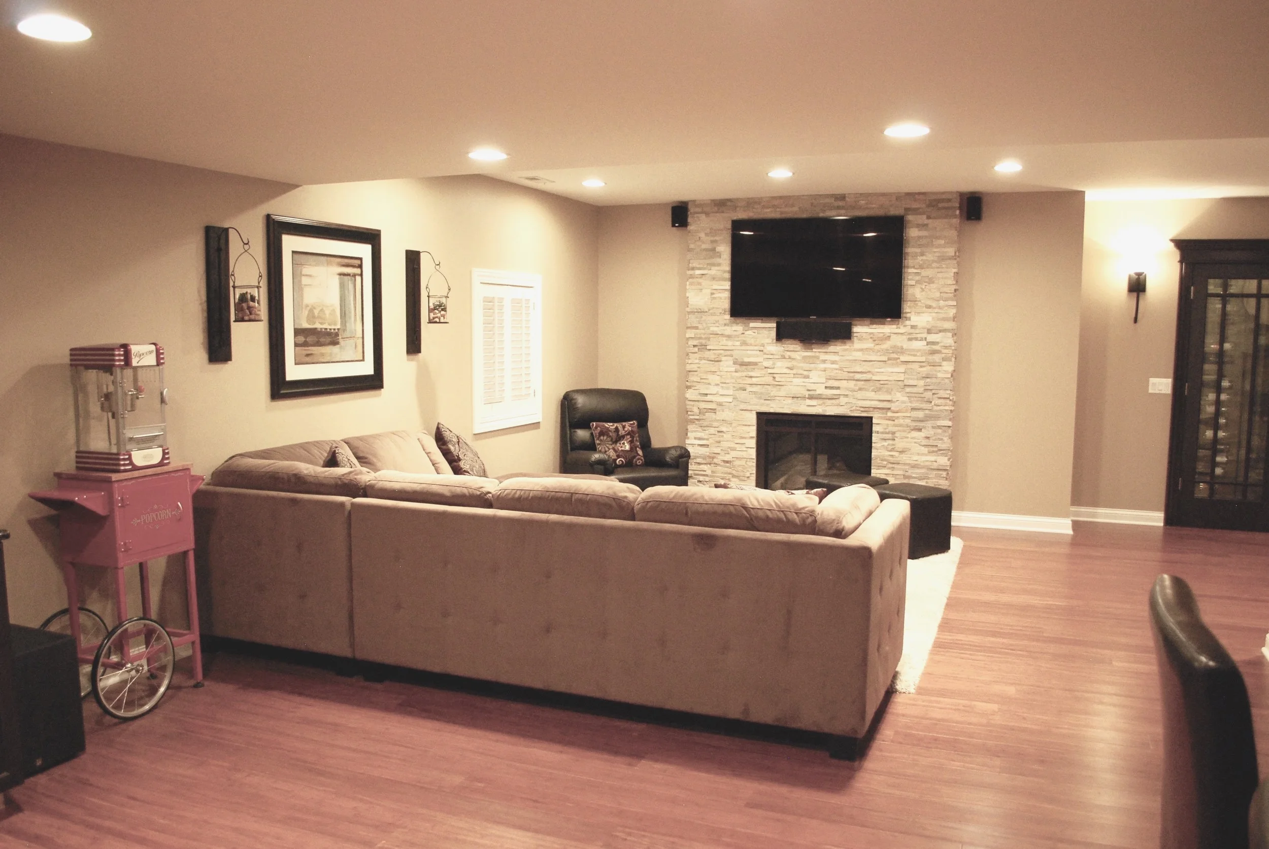 St. Charles Finished Basement with Stacked Stone Fireplace 