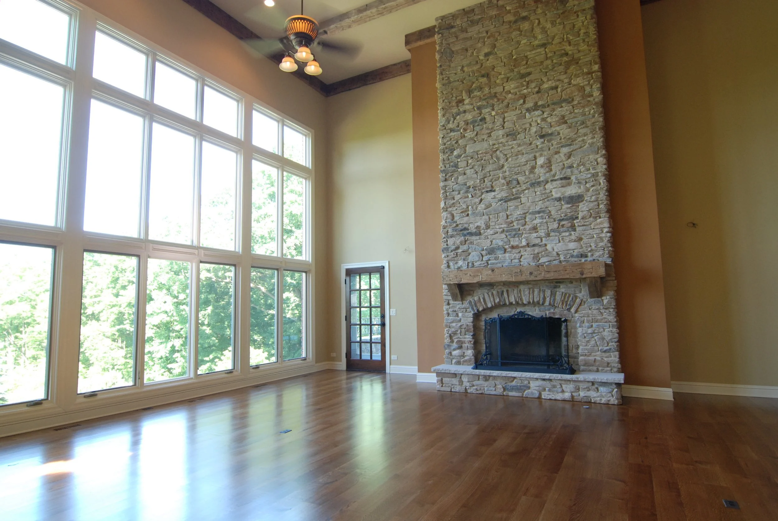 Geneva IL. Fireplace Remodel in Custom Two-story Family Room.